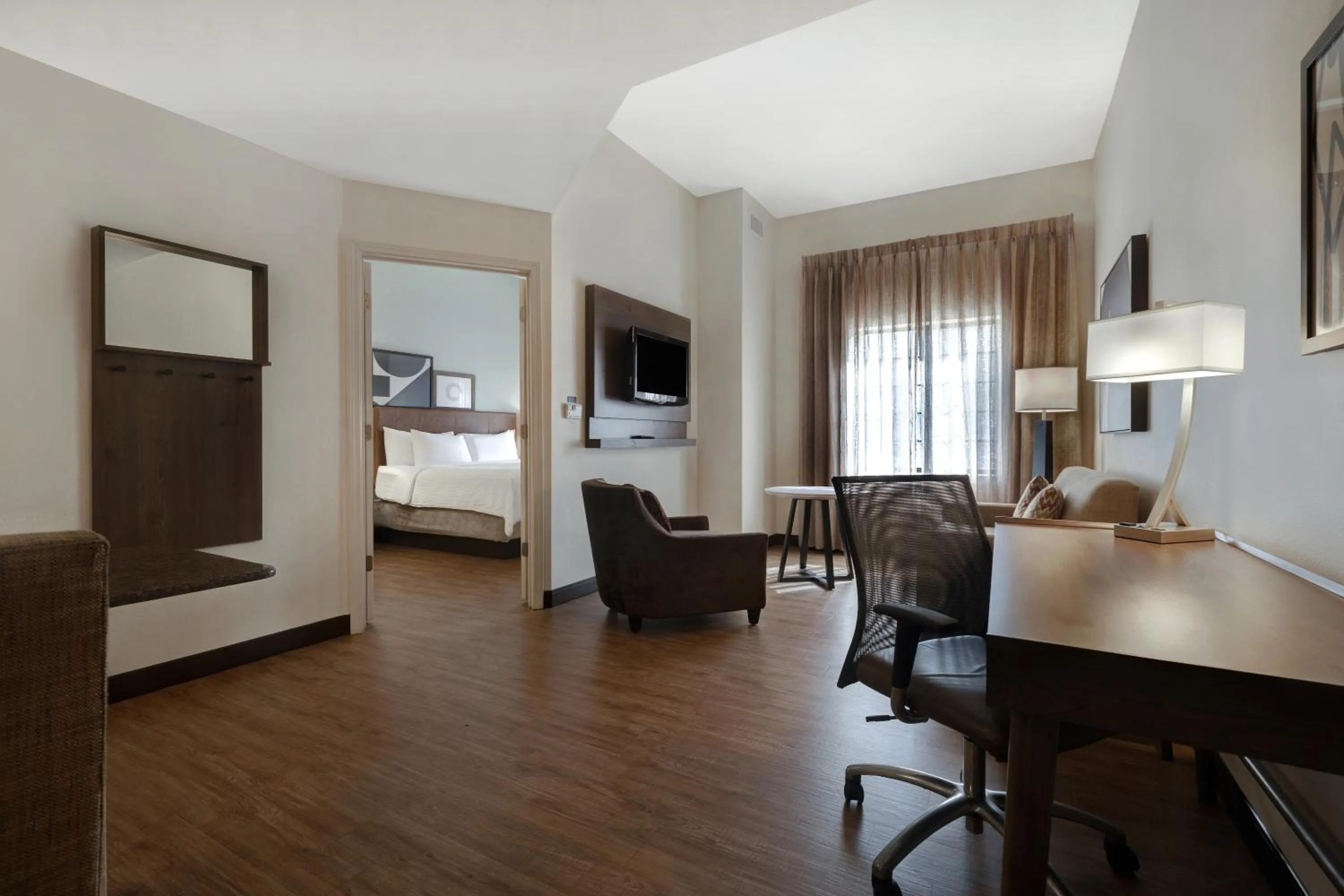 Living room, Bed in Staybridge Suites Tallahassee I-10 East by IHG