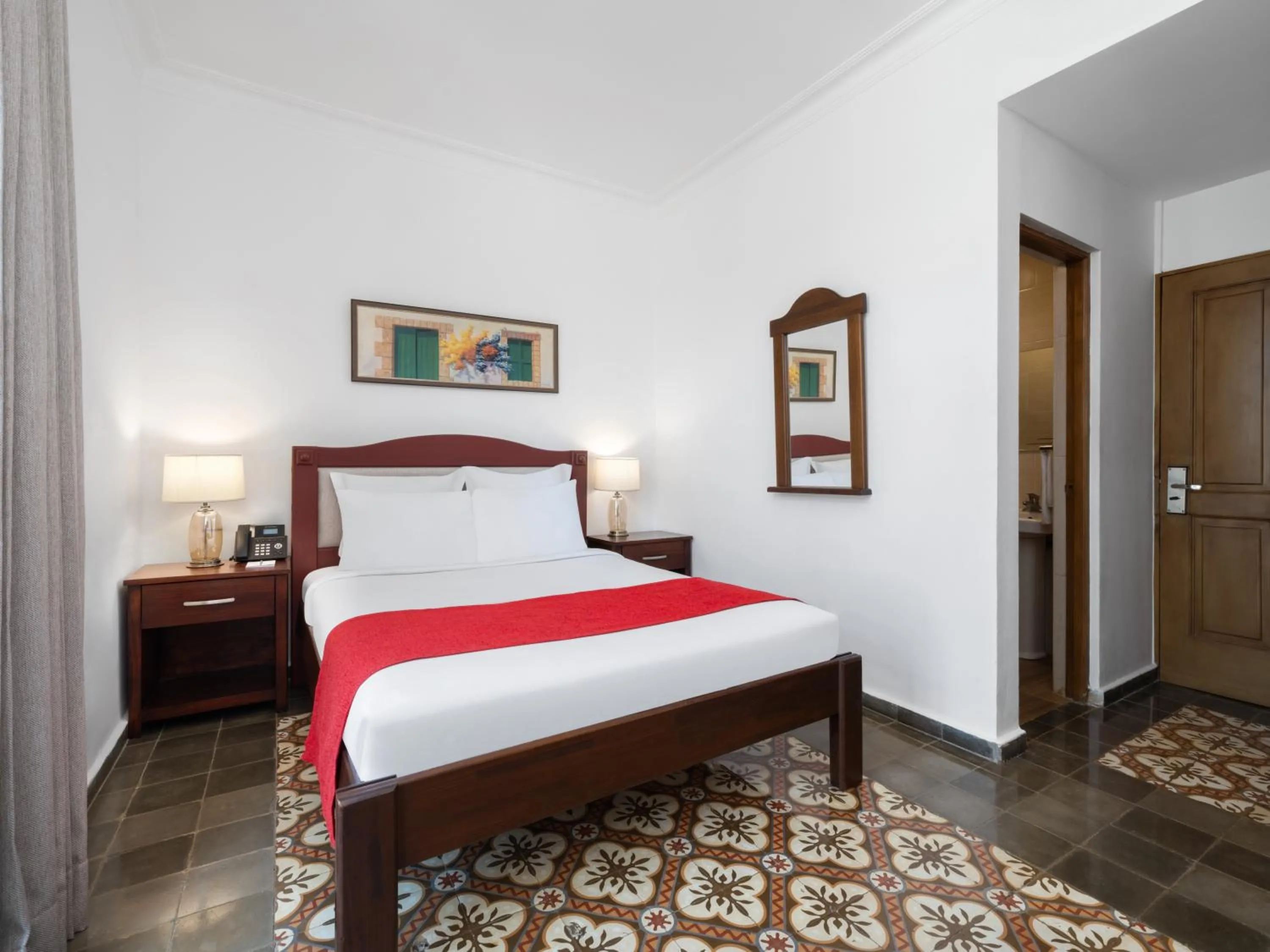 Bed in Gran Hotel Europa Santo Domingo Trademark Collection by Wyndham