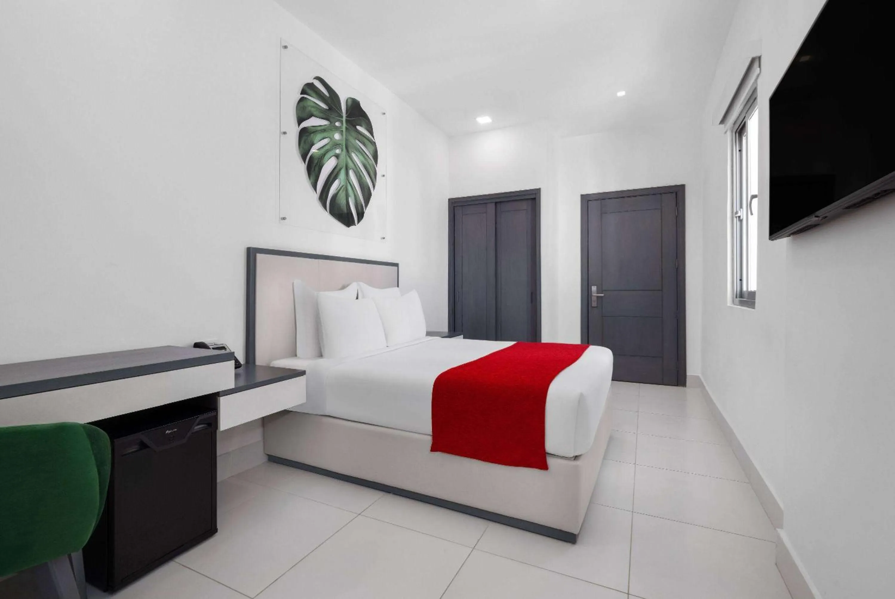 Photo of the whole room, Bed in Gran Hotel Europa Santo Domingo Trademark Collection by Wyndham