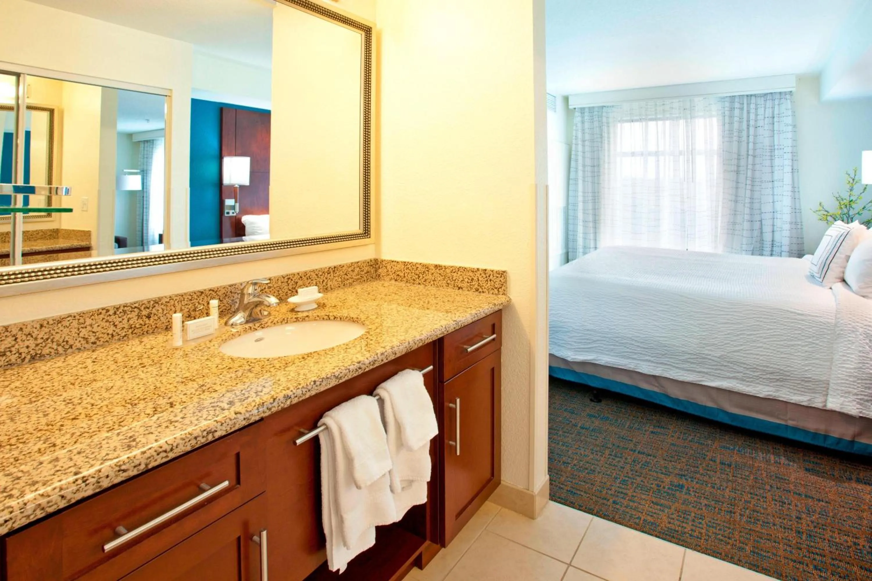 Bathroom, Bed in Residence Inn by Marriott Portland Airport at Cascade Station