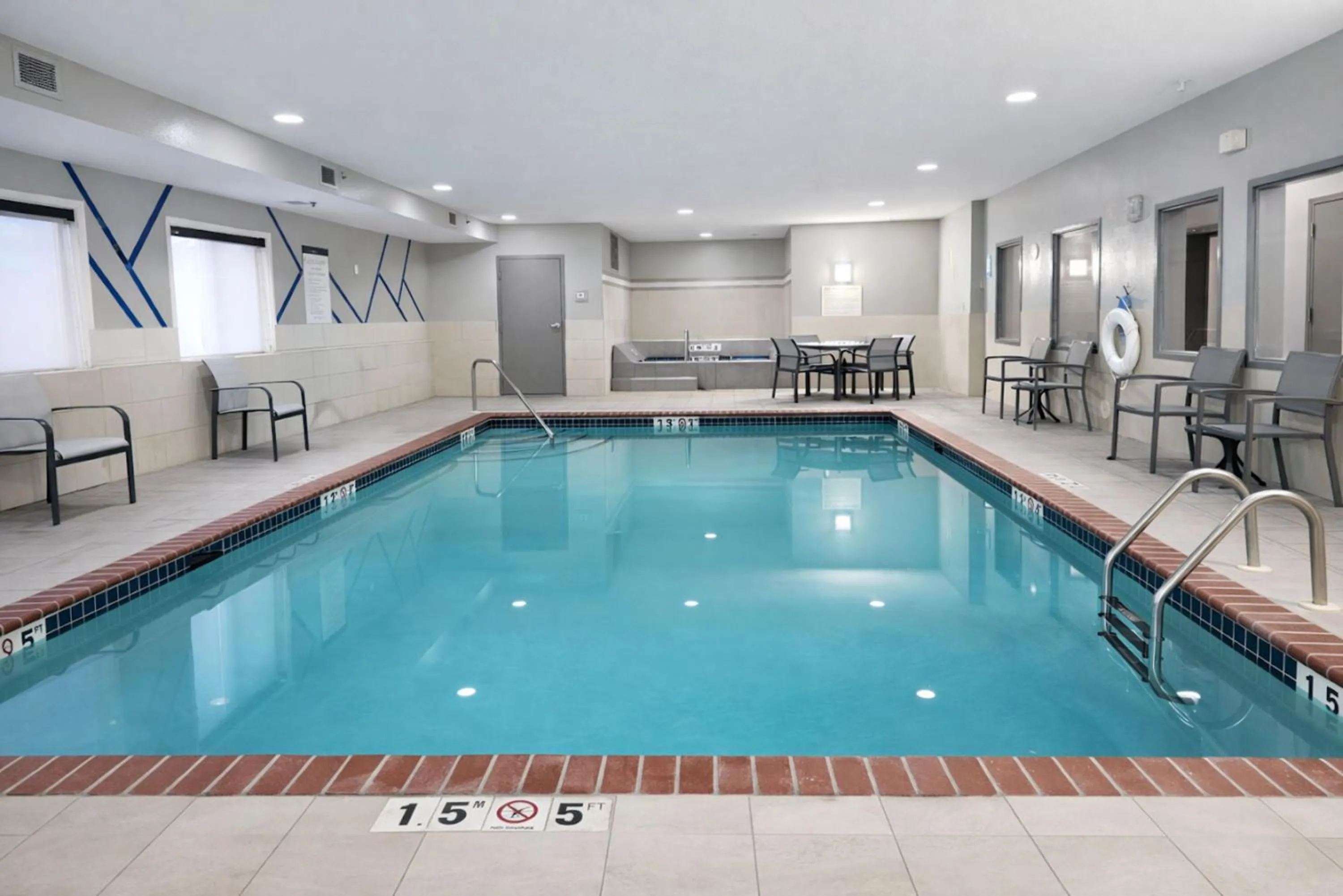 Swimming pool in Holiday Inn Express Hotel & Suites St. Paul - Woodbury by IHG