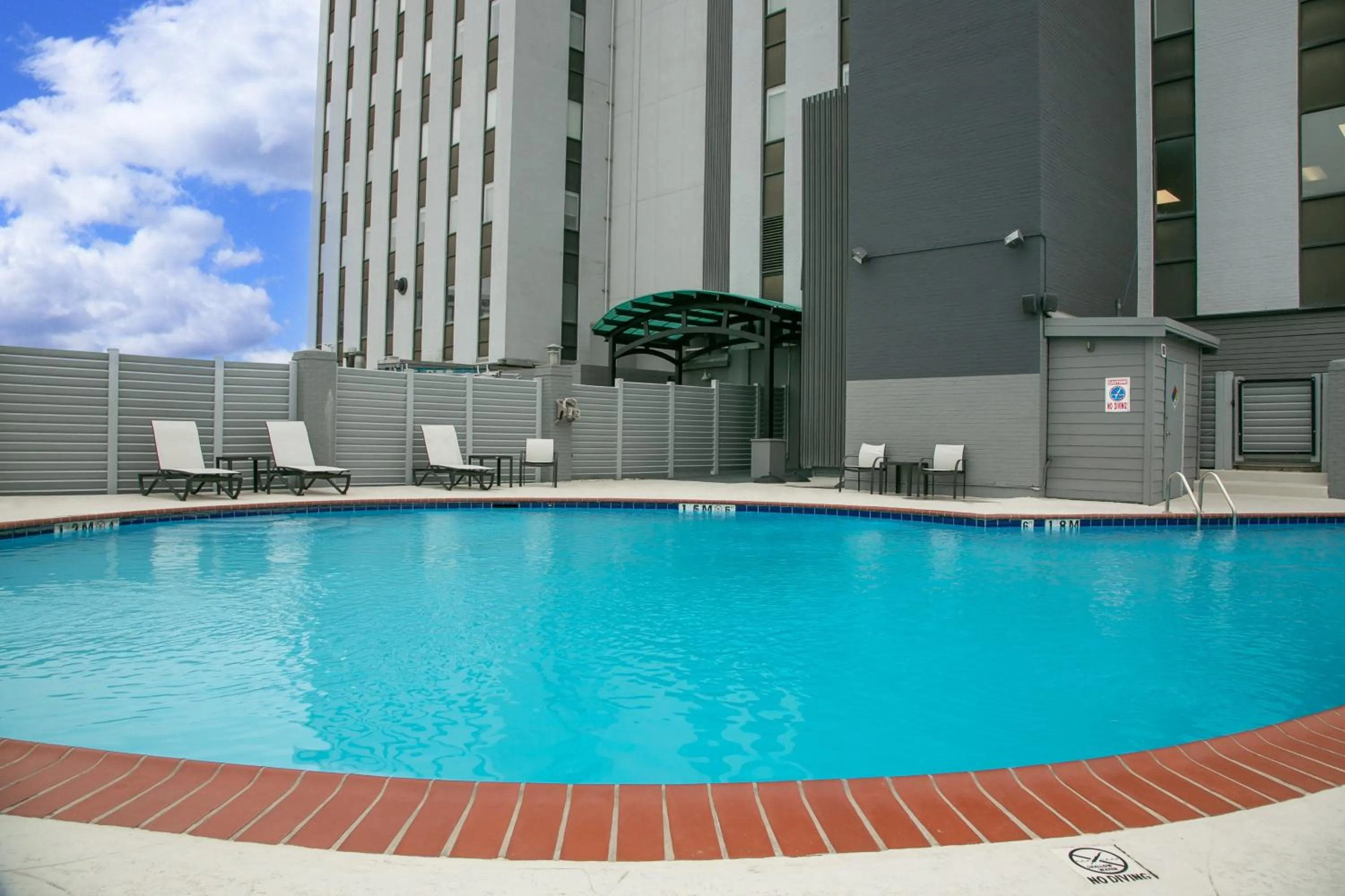 Swimming pool in Holiday Inn Metairie New Orleans by IHG