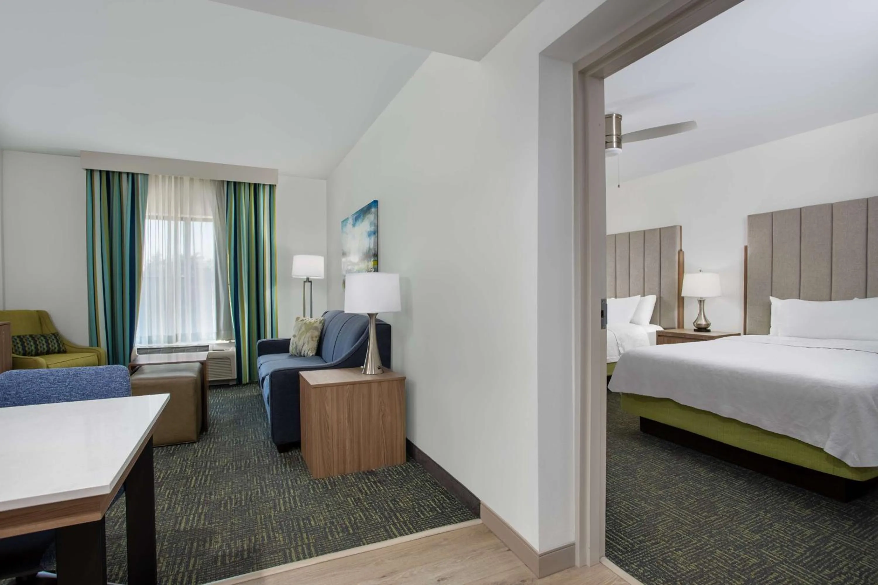 Living room, Bed in Homewood Suites by Hilton Davidson