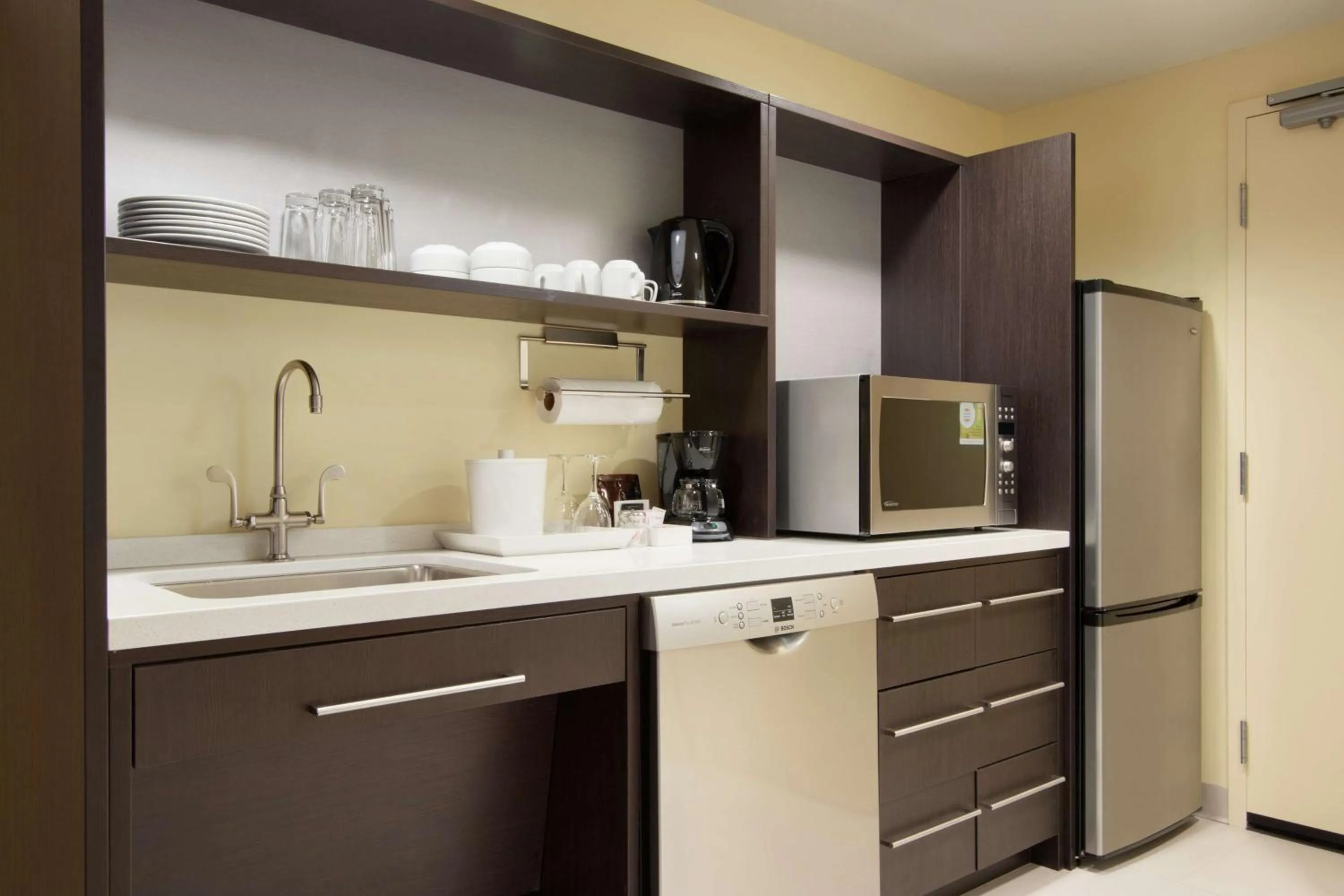 Kitchen or kitchenette in Home2 Suites by Hilton Fort St. John