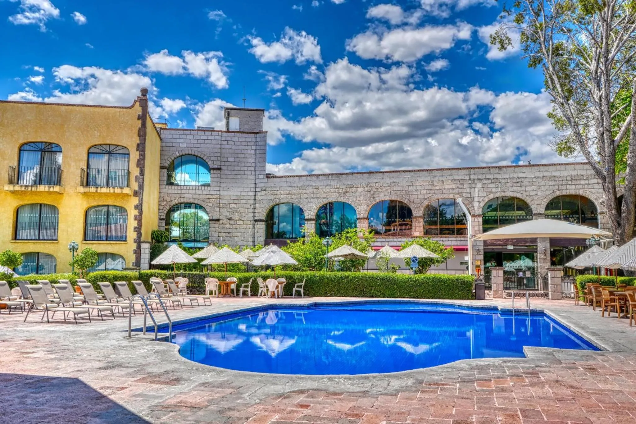 Swimming pool in Holiday Inn Queretaro Centro Historico by IHG