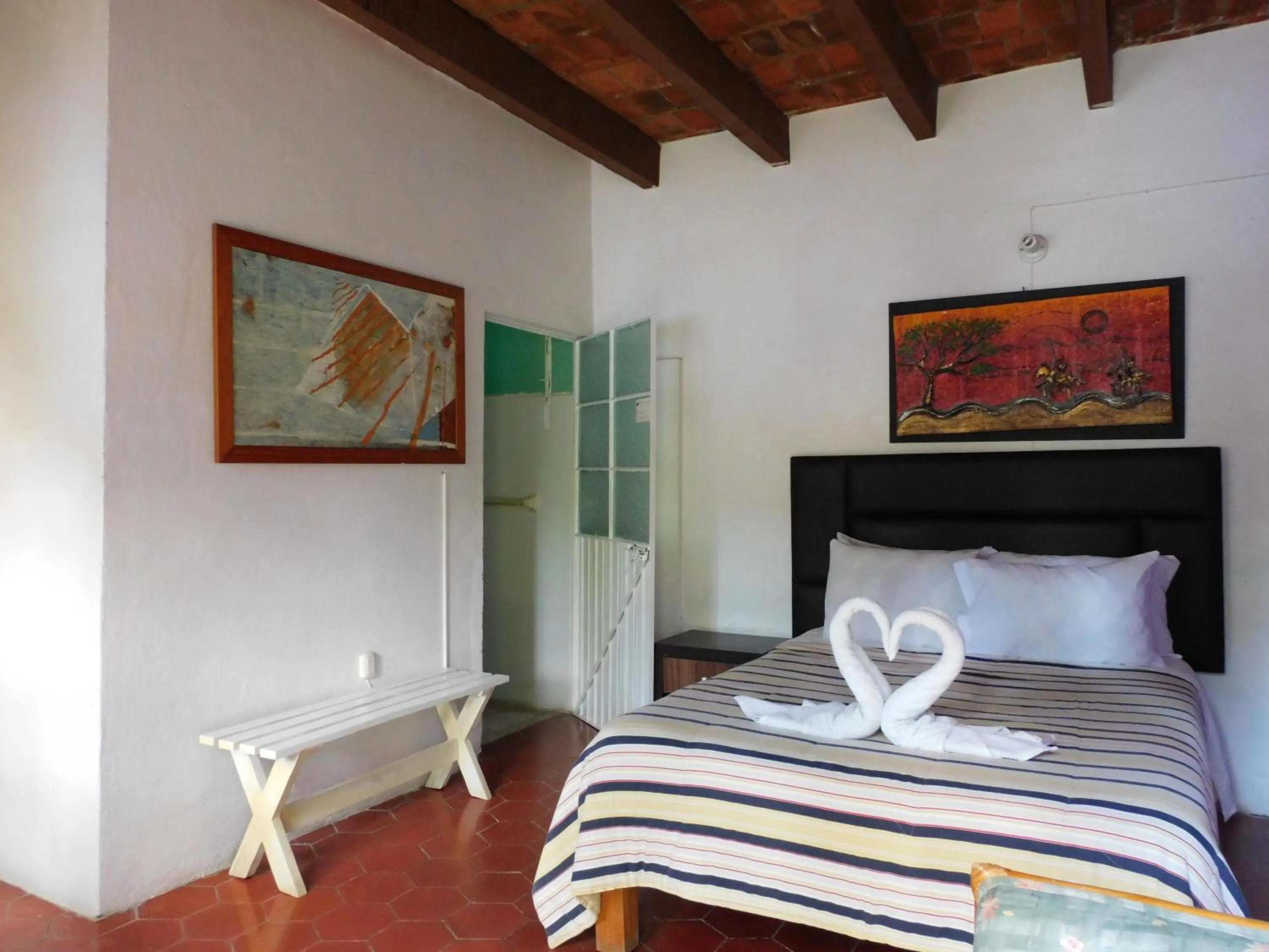 Bed in Hotel Elohim by Rotamundos