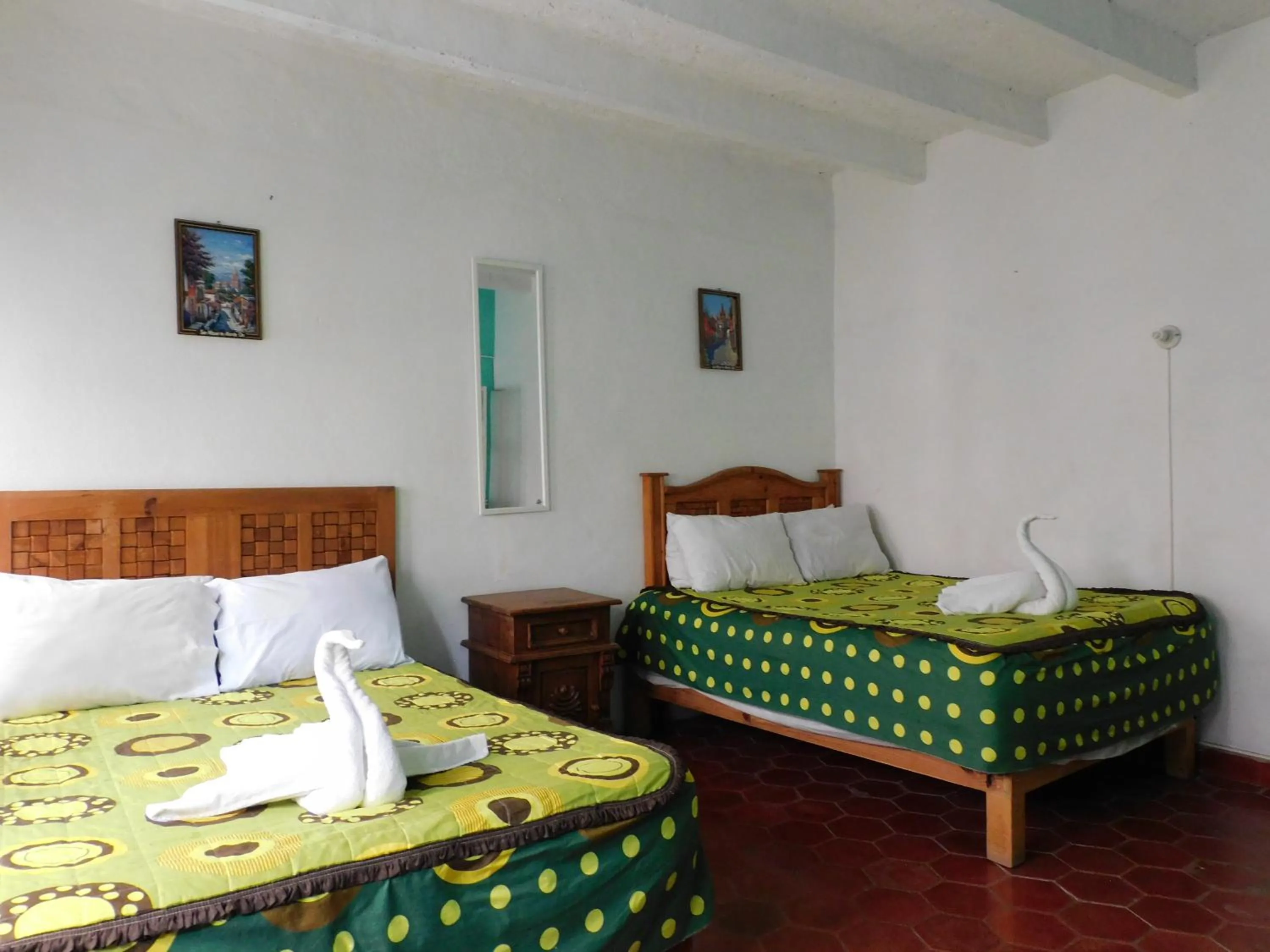 Bed in Hotel Elohim by Rotamundos