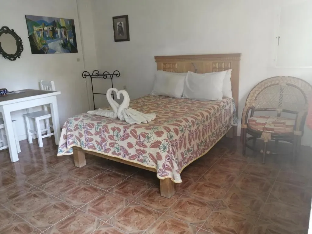 Bed in Hotel Elohim by Rotamundos