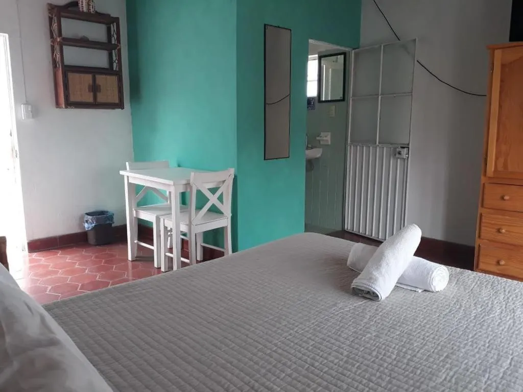 Bed in Hotel Elohim by Rotamundos