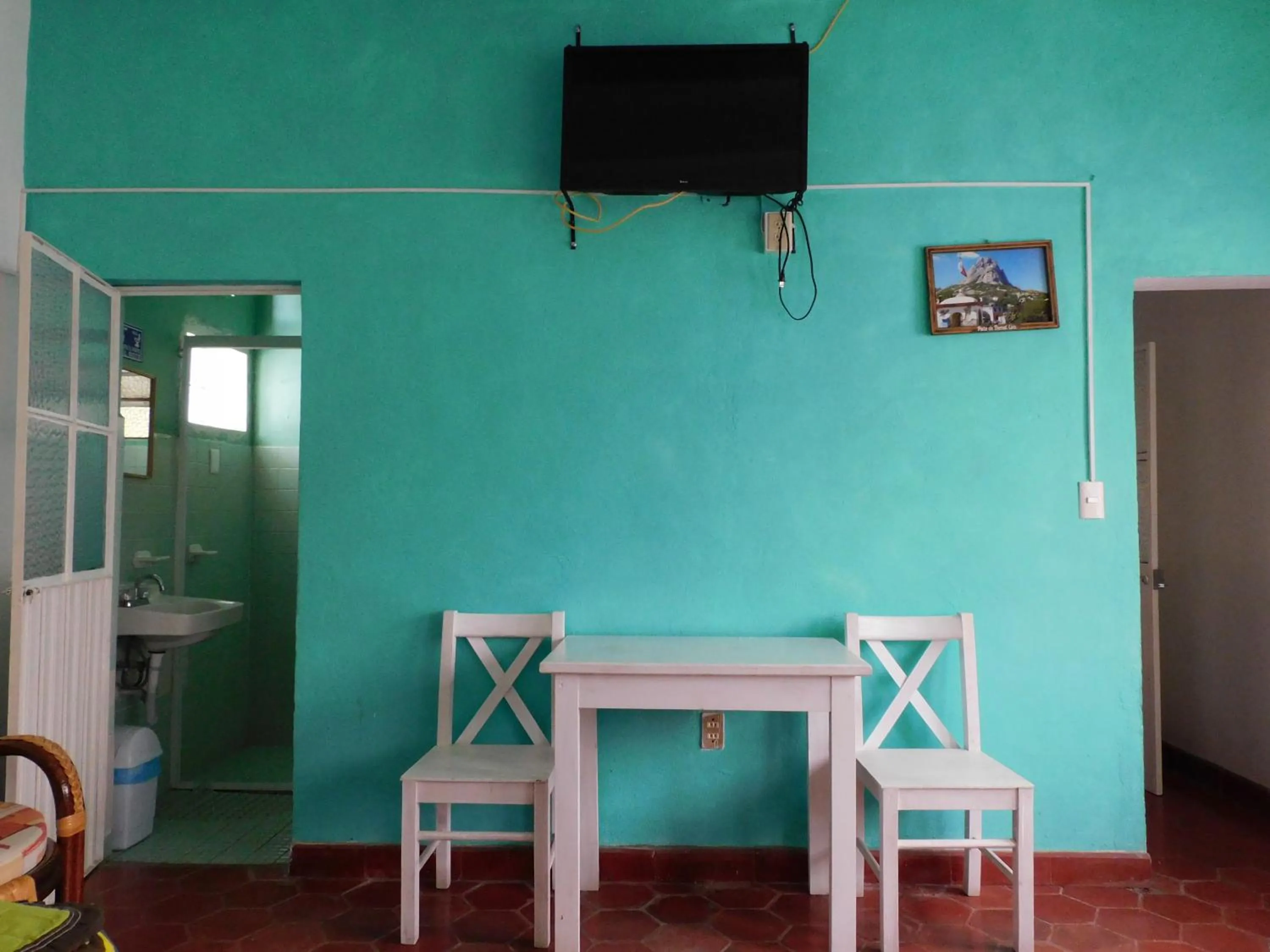 TV/Entertainment Center in Hotel Elohim by Rotamundos