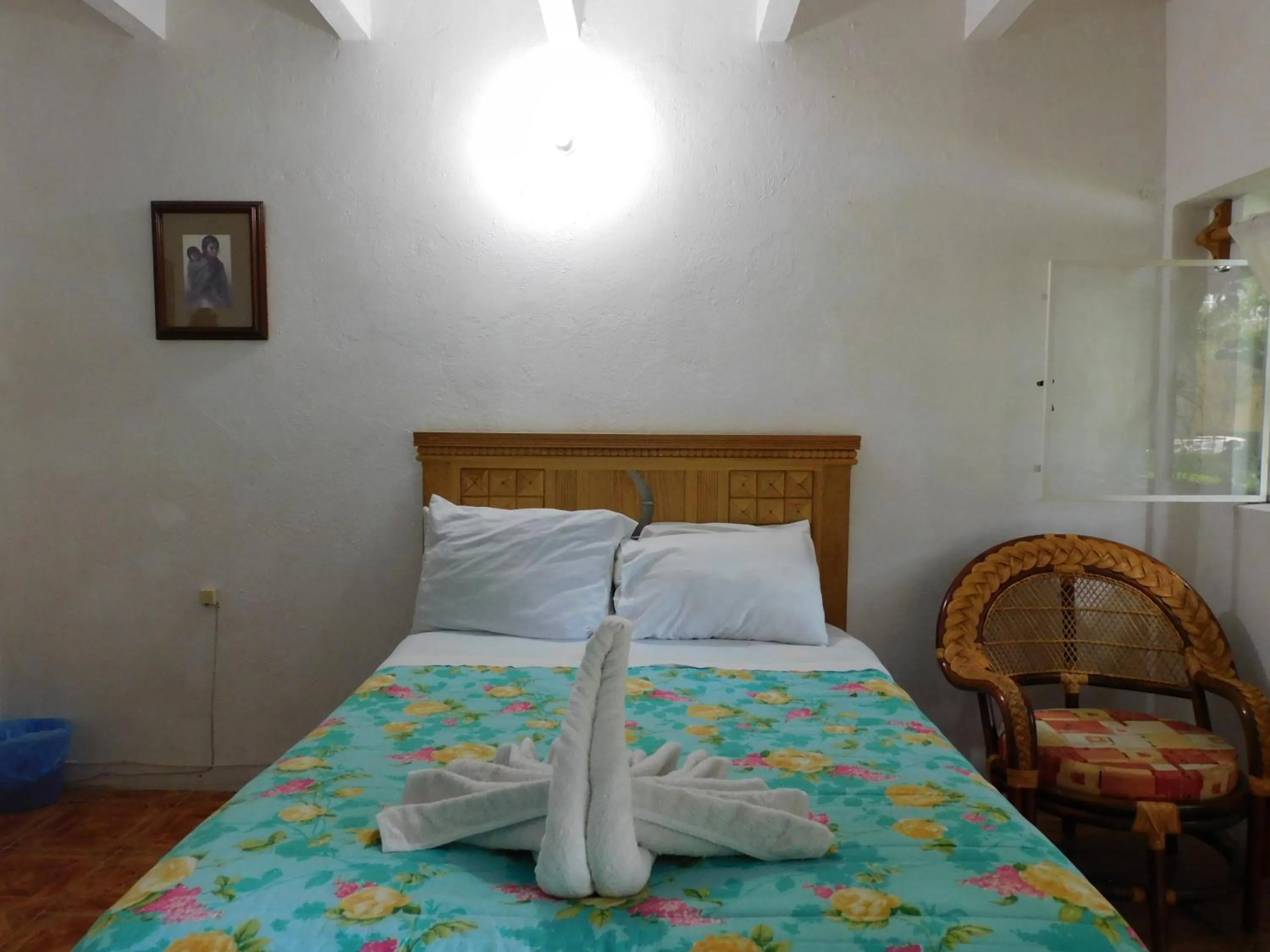 Bed in Hotel Elohim by Rotamundos