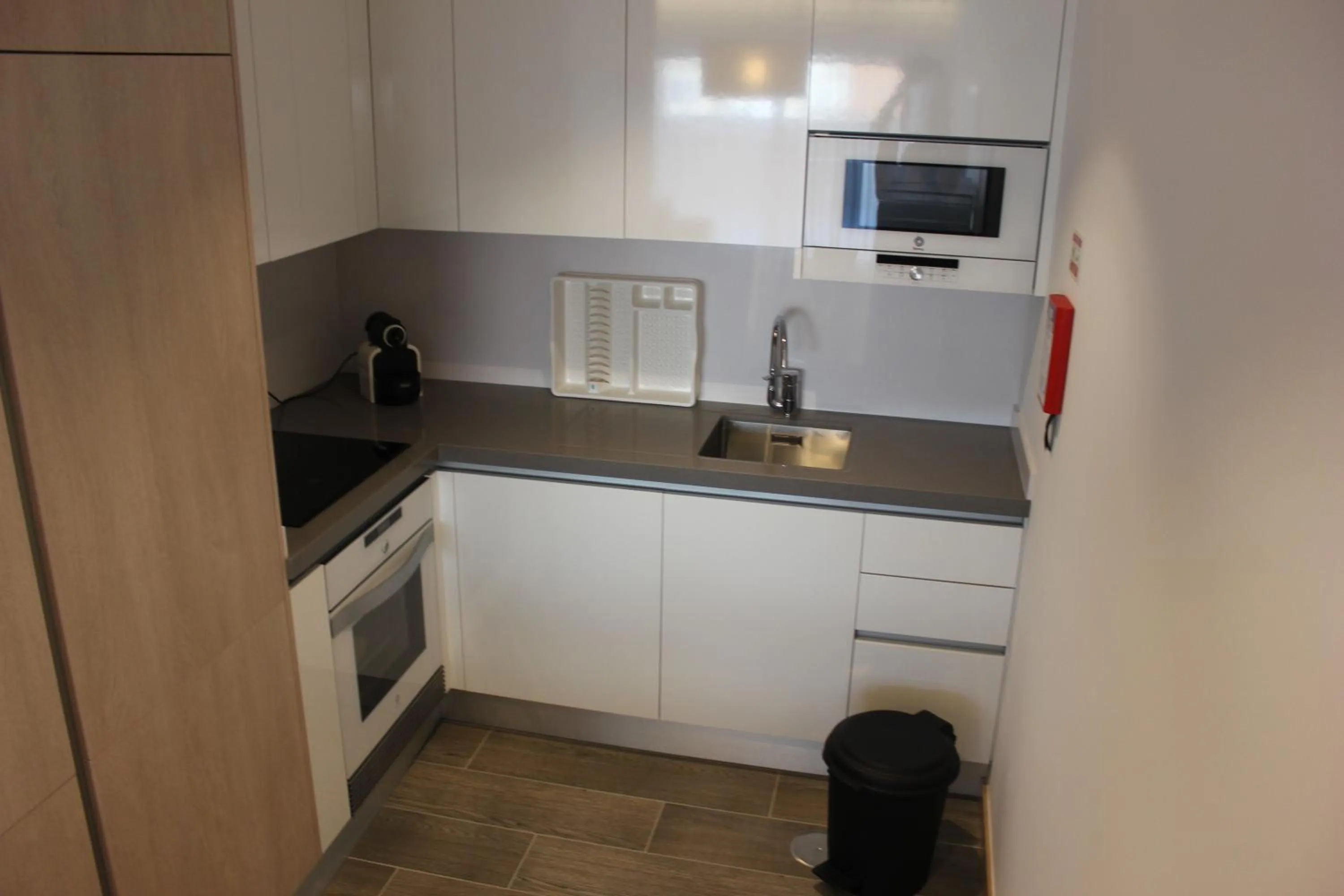 Kitchen or kitchenette in Apartamentos Turisticos da Nazare