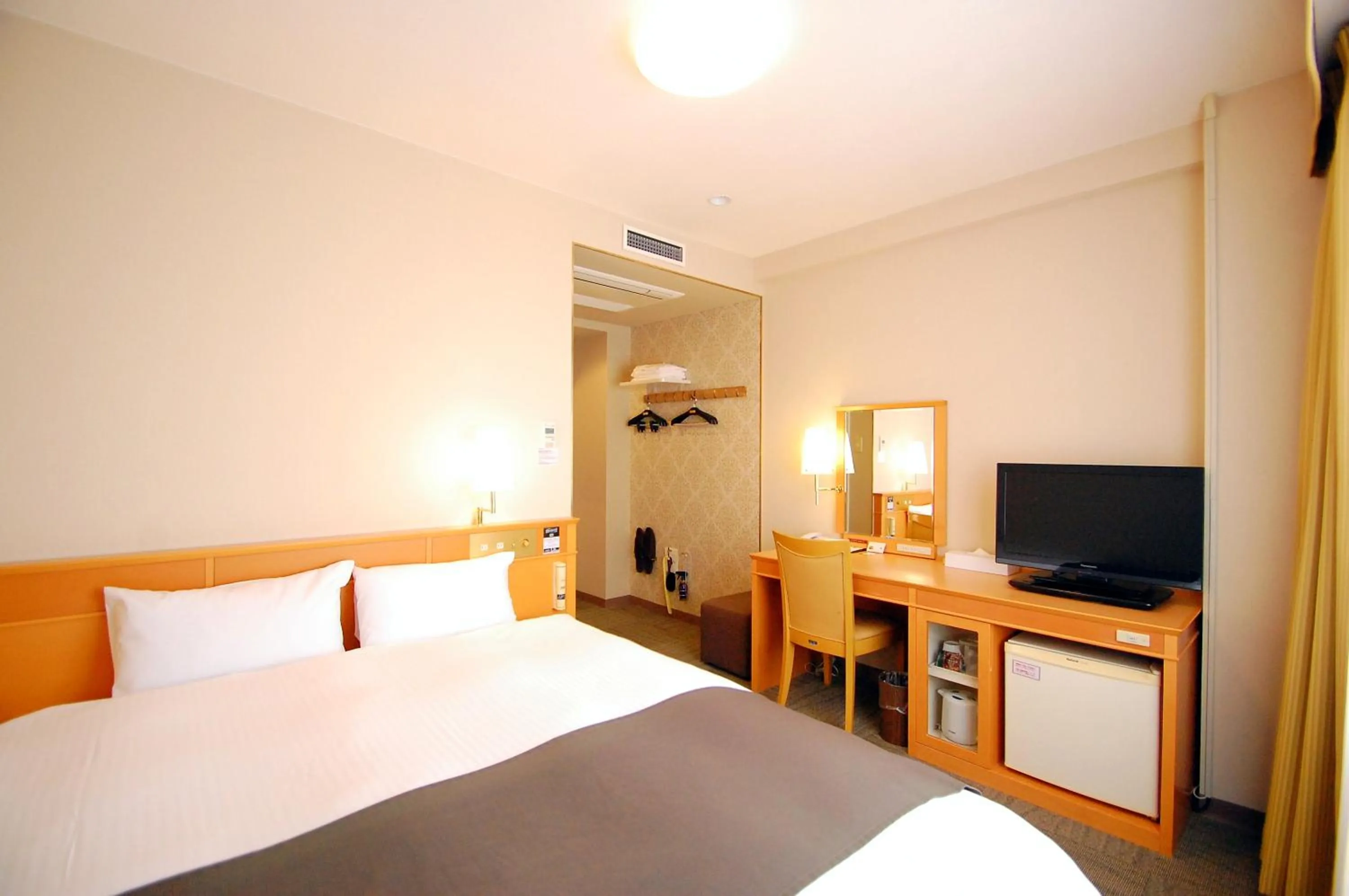 Bed in Izumo Royal Hotel