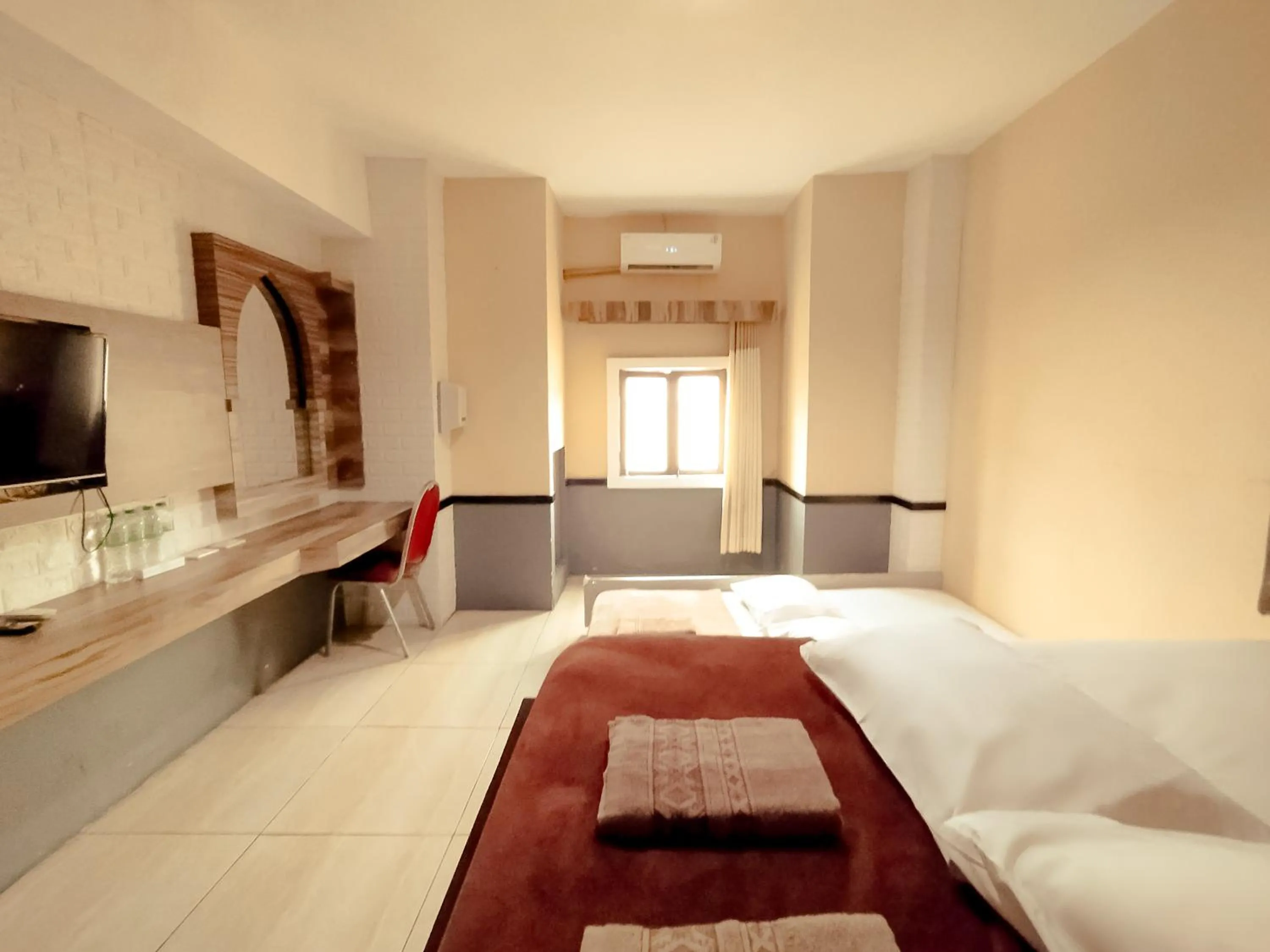 Bed in Hotel Syariah Larismanis