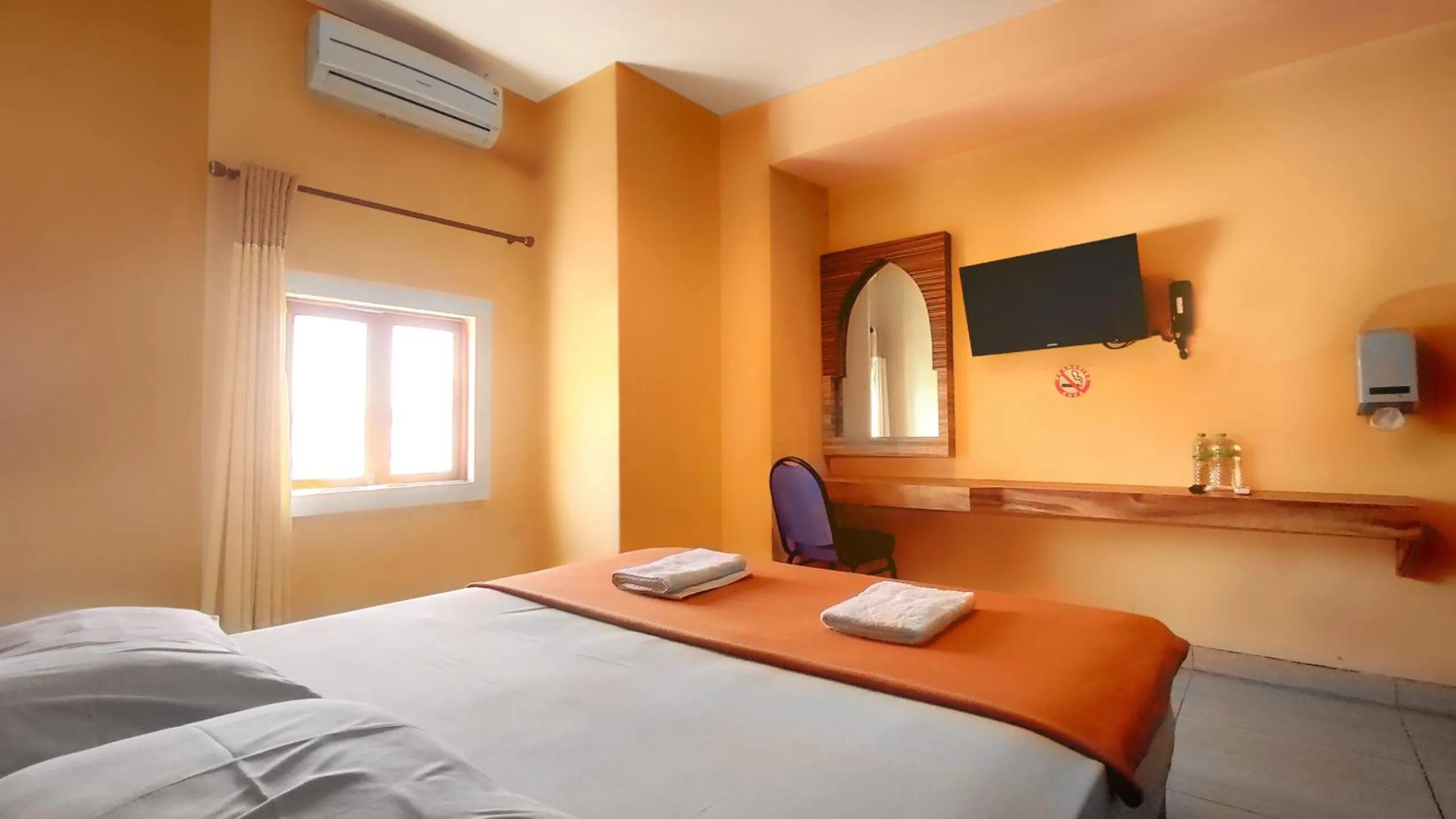 Bed in Hotel Syariah Larismanis