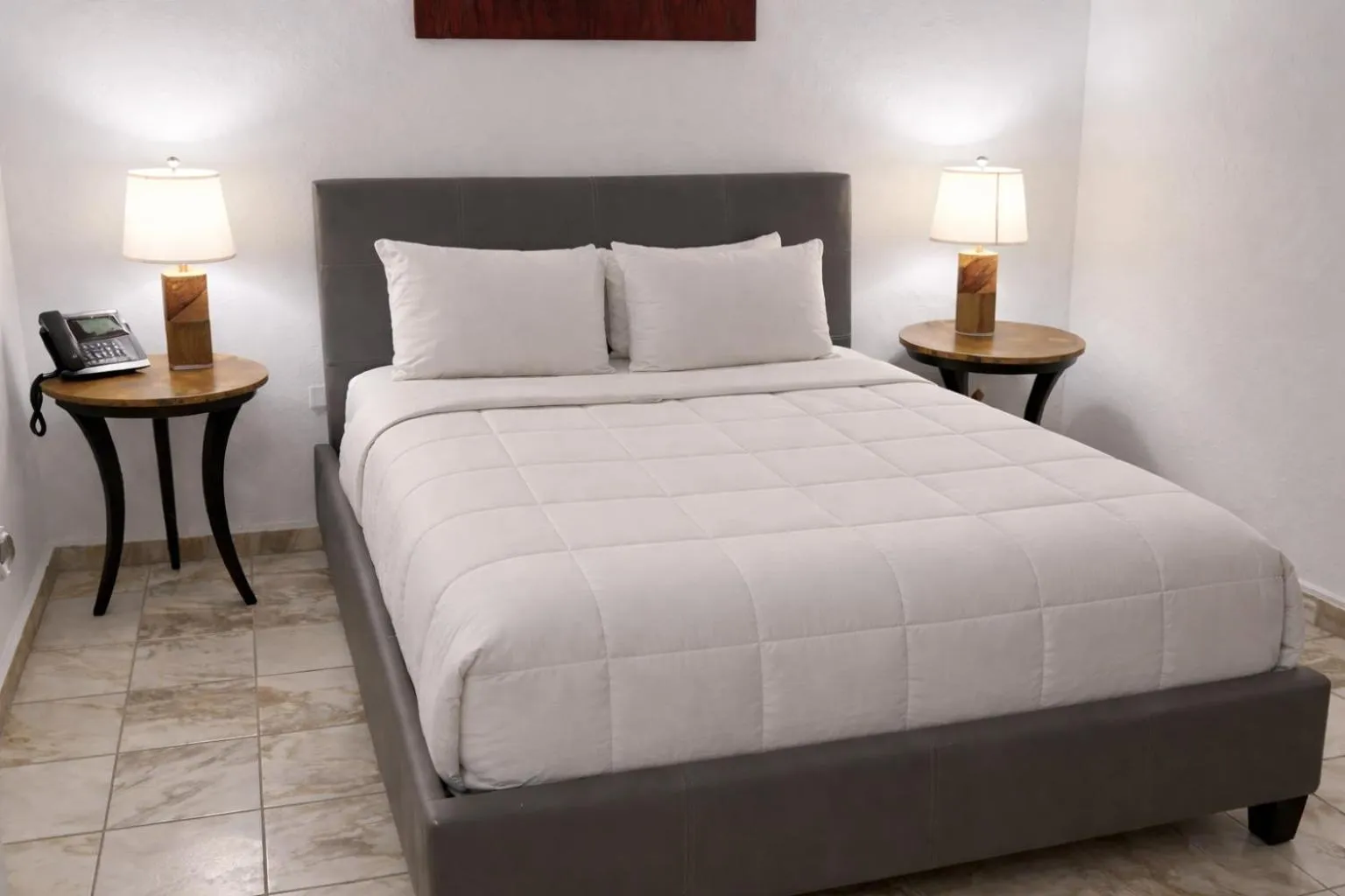 Bed in Coral Princess Hotel