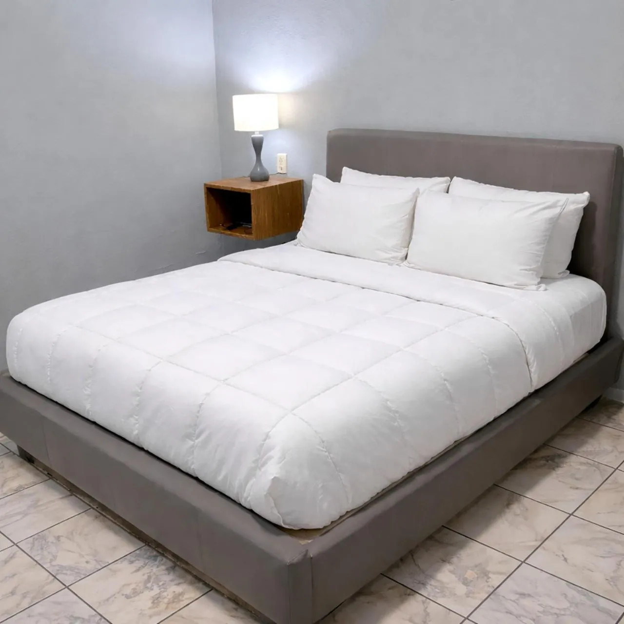 Bed in Coral Princess Hotel