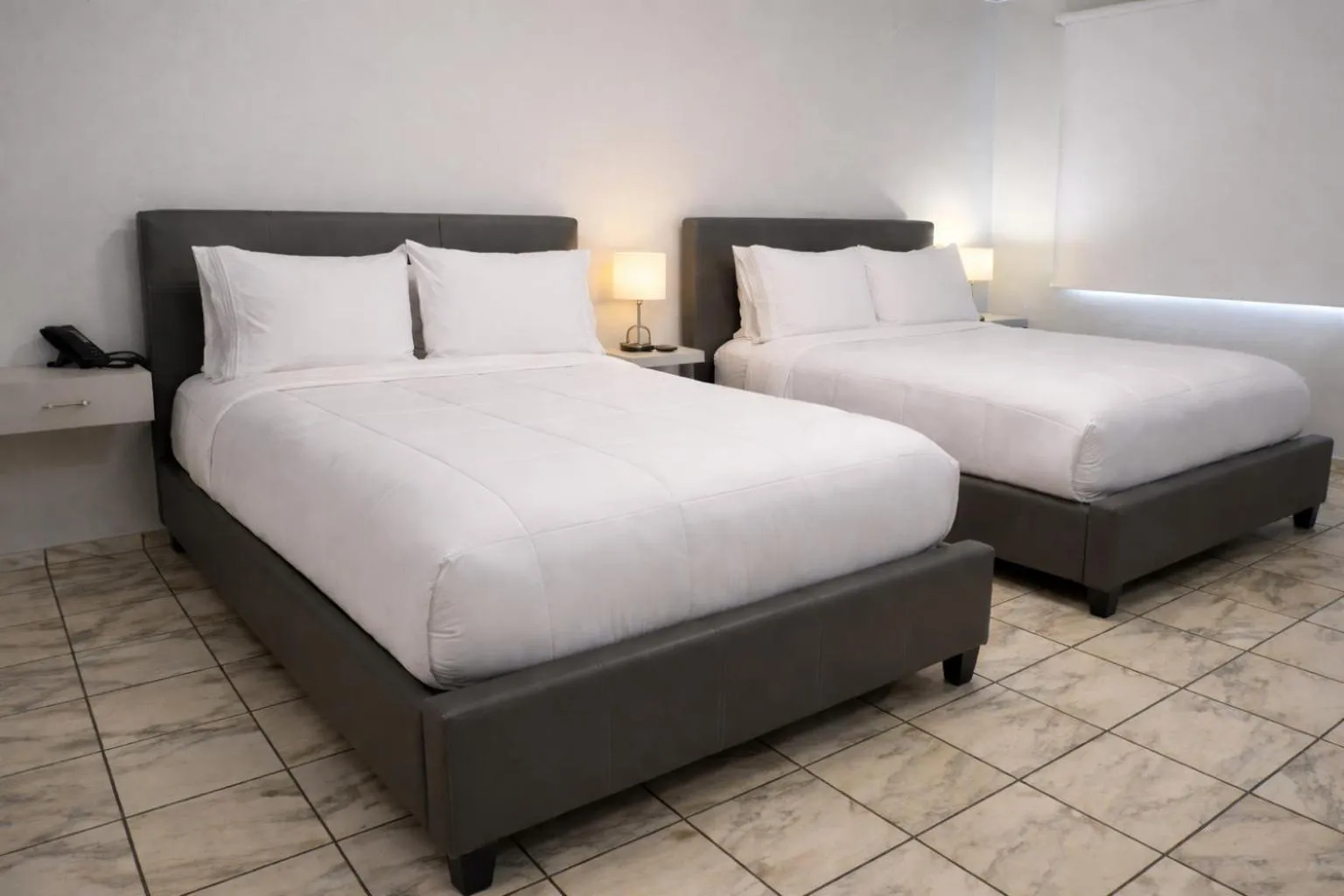 Bed in Coral Princess Hotel