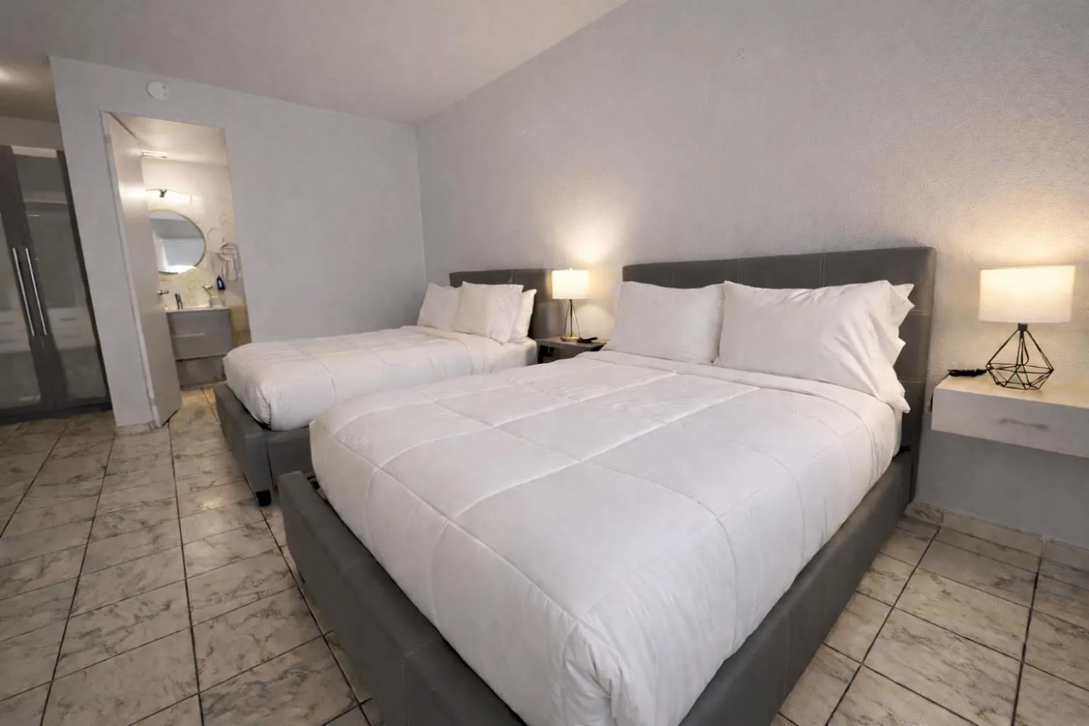 Bed in Coral Princess Hotel