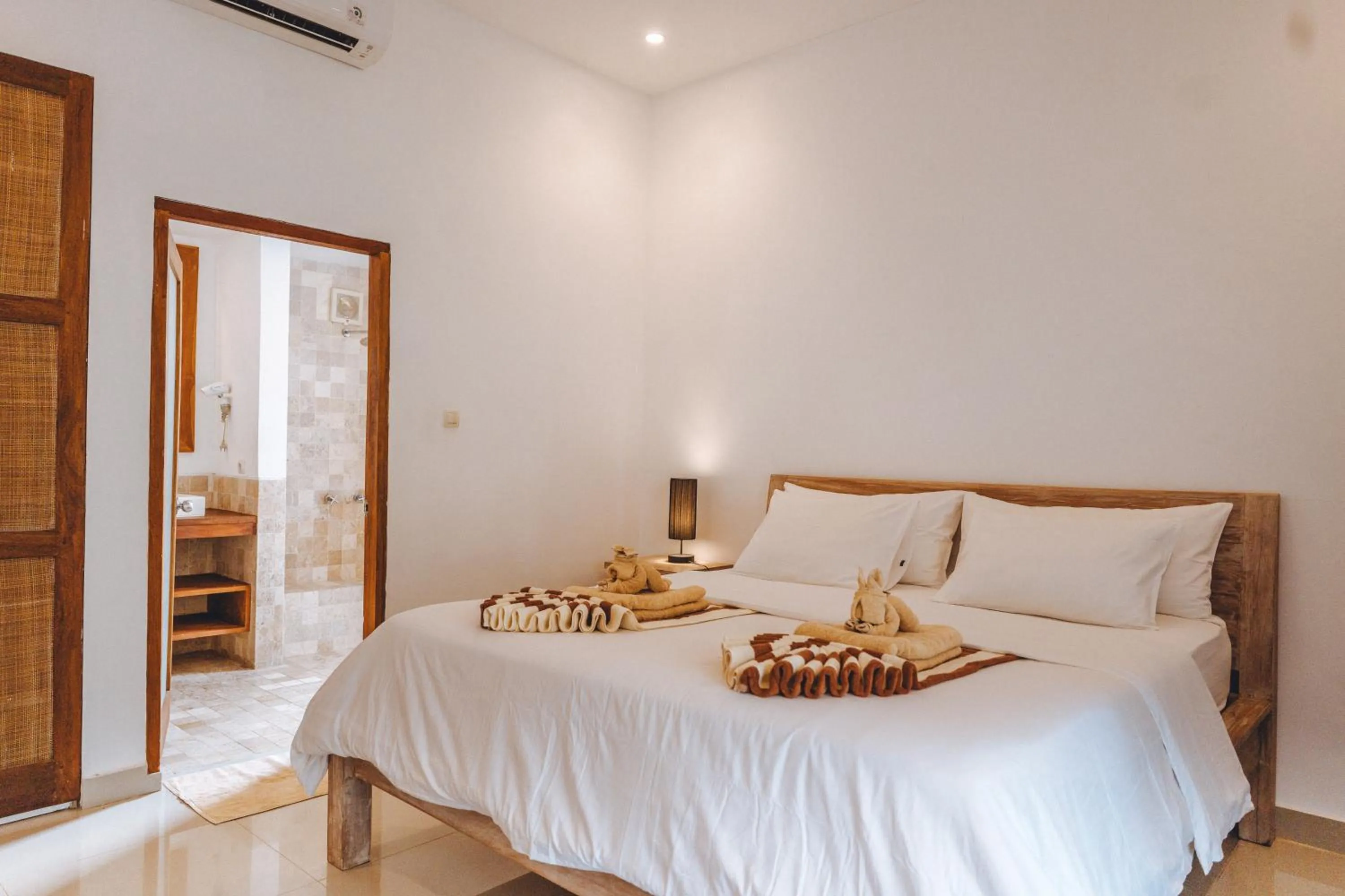 Property building, Bed in Blue Marlin Dive Gili Air