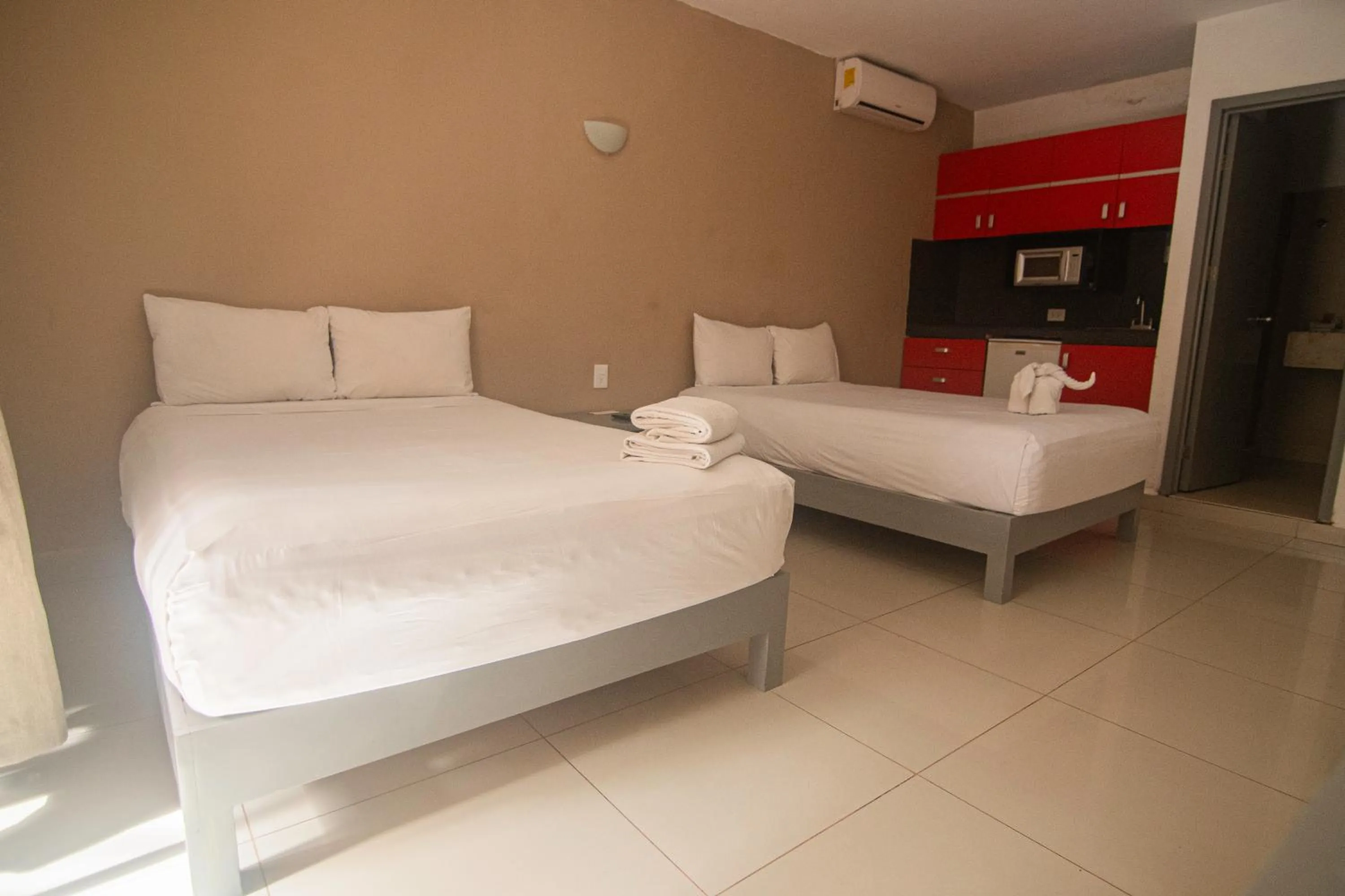 Bed in Hotel Maya Turquesa