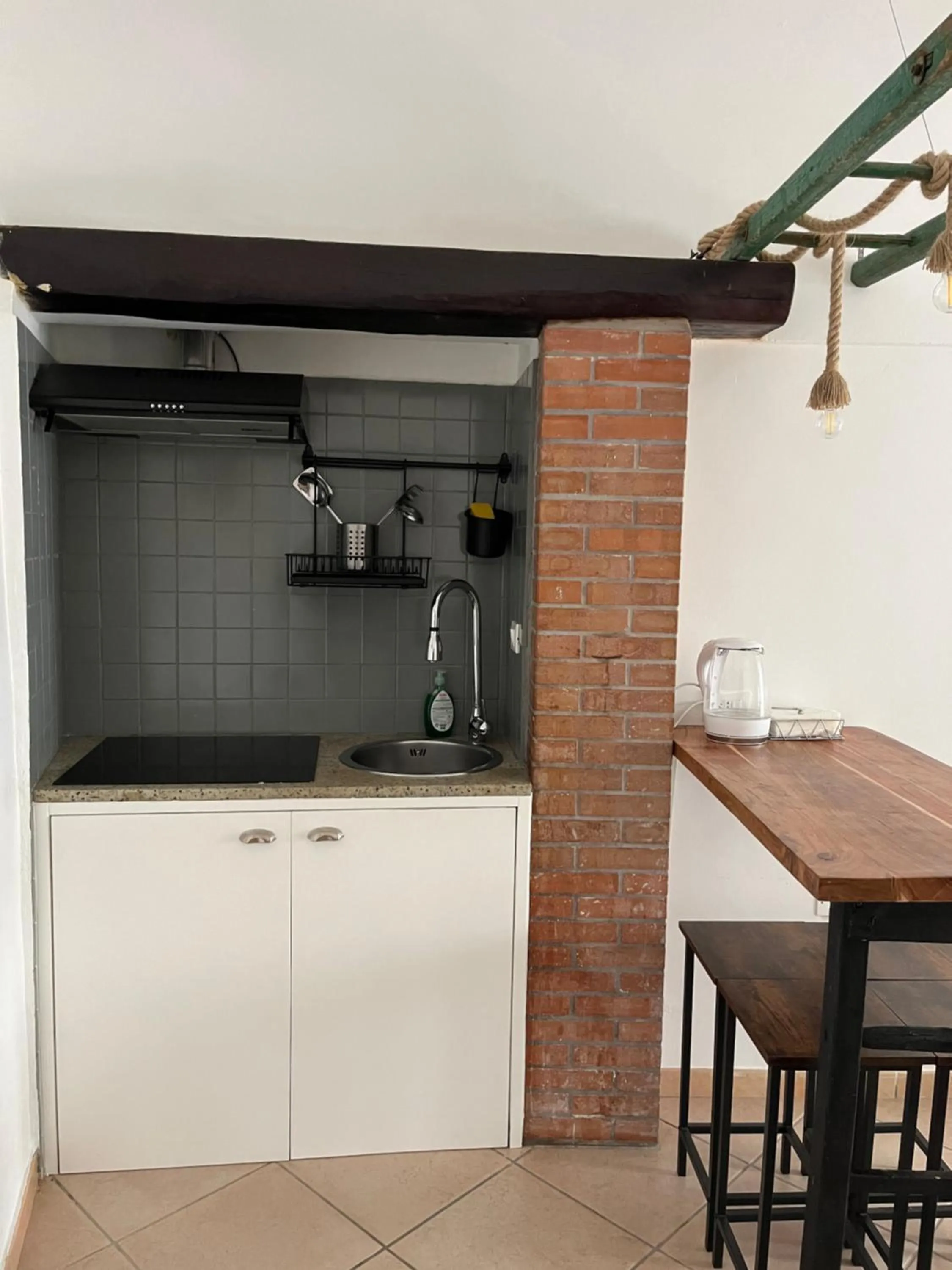 Kitchen or kitchenette in Ostuni 21mq Suite Homes