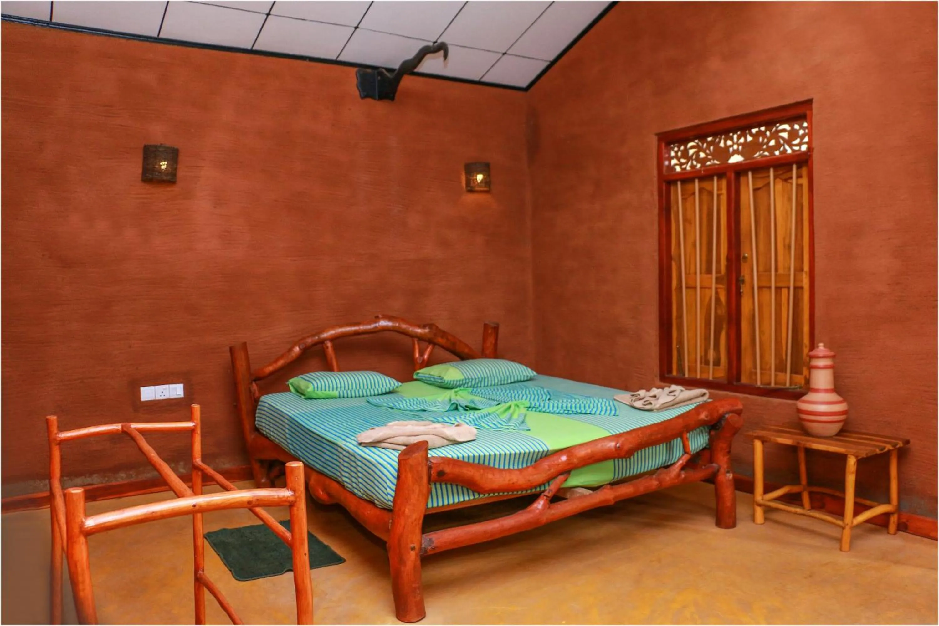 Bed in Yala Peace Cottages