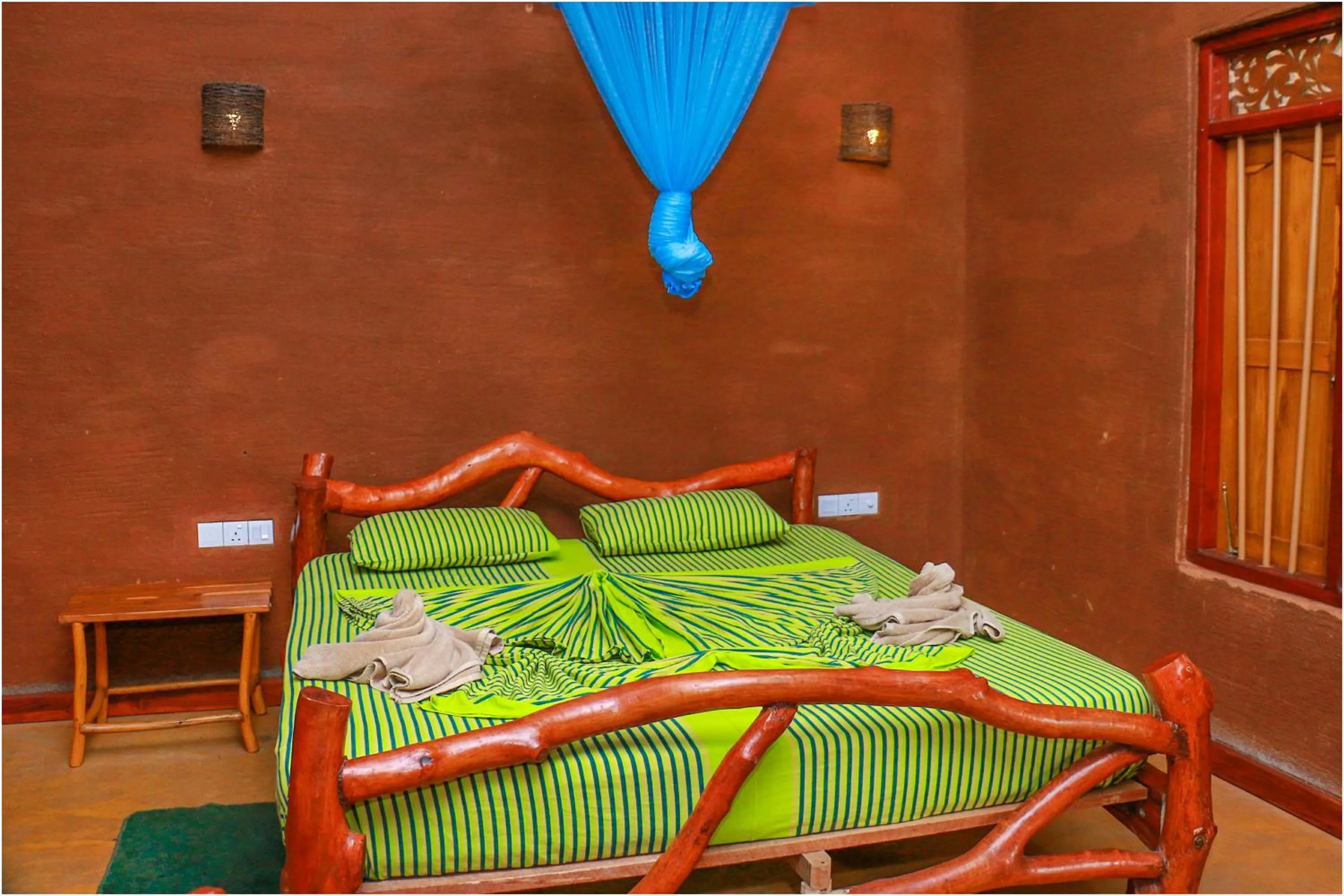 Bed in Yala Peace Cottages