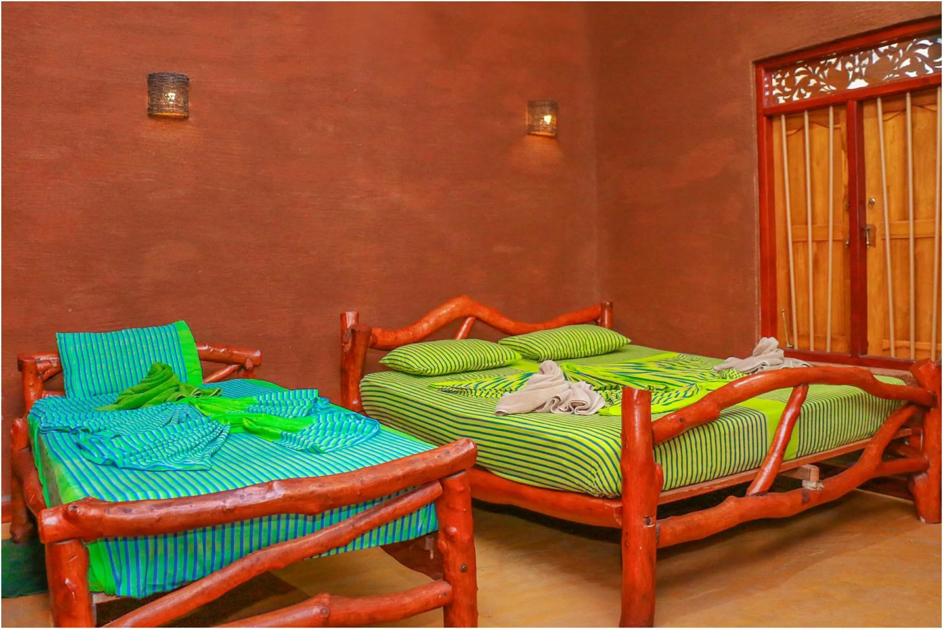 Bed in Yala Peace Cottages