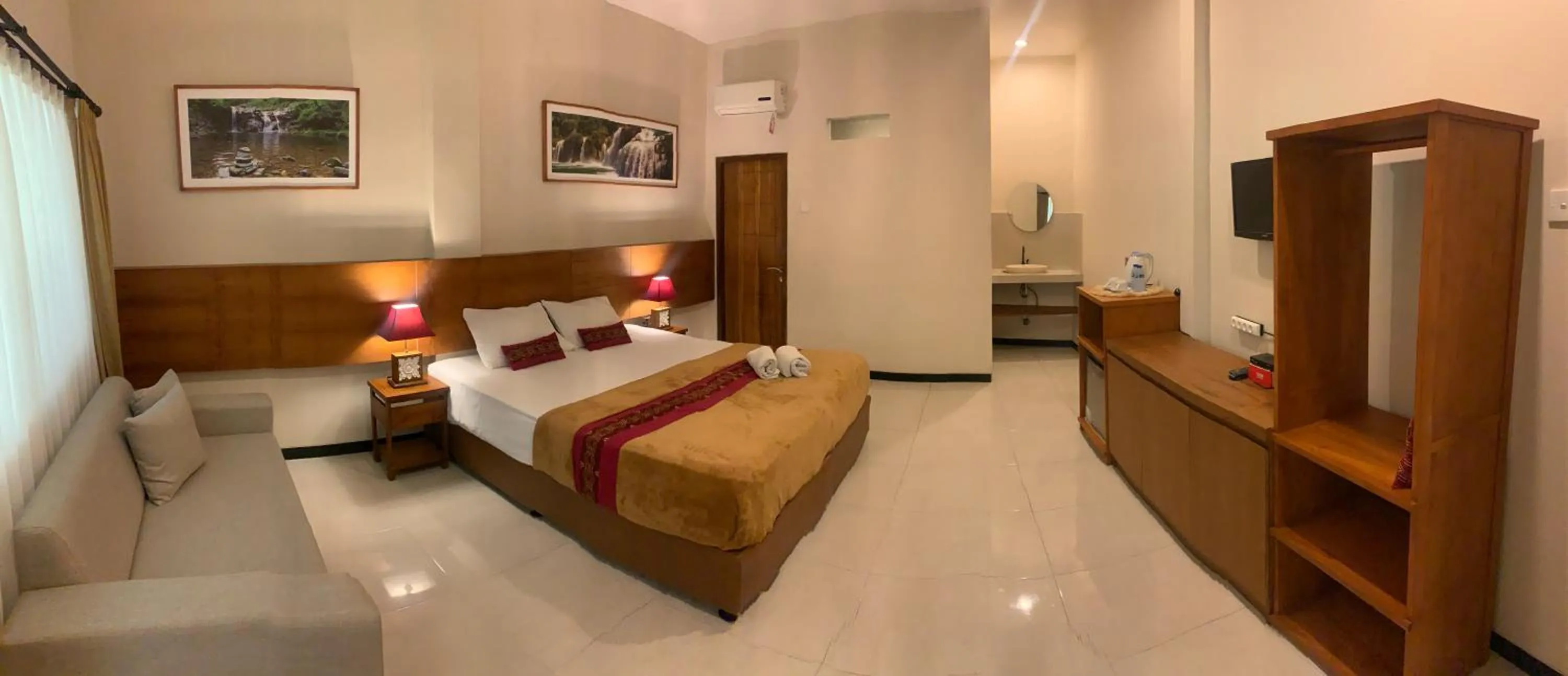 Bed in Kuta Suci Guesthouse