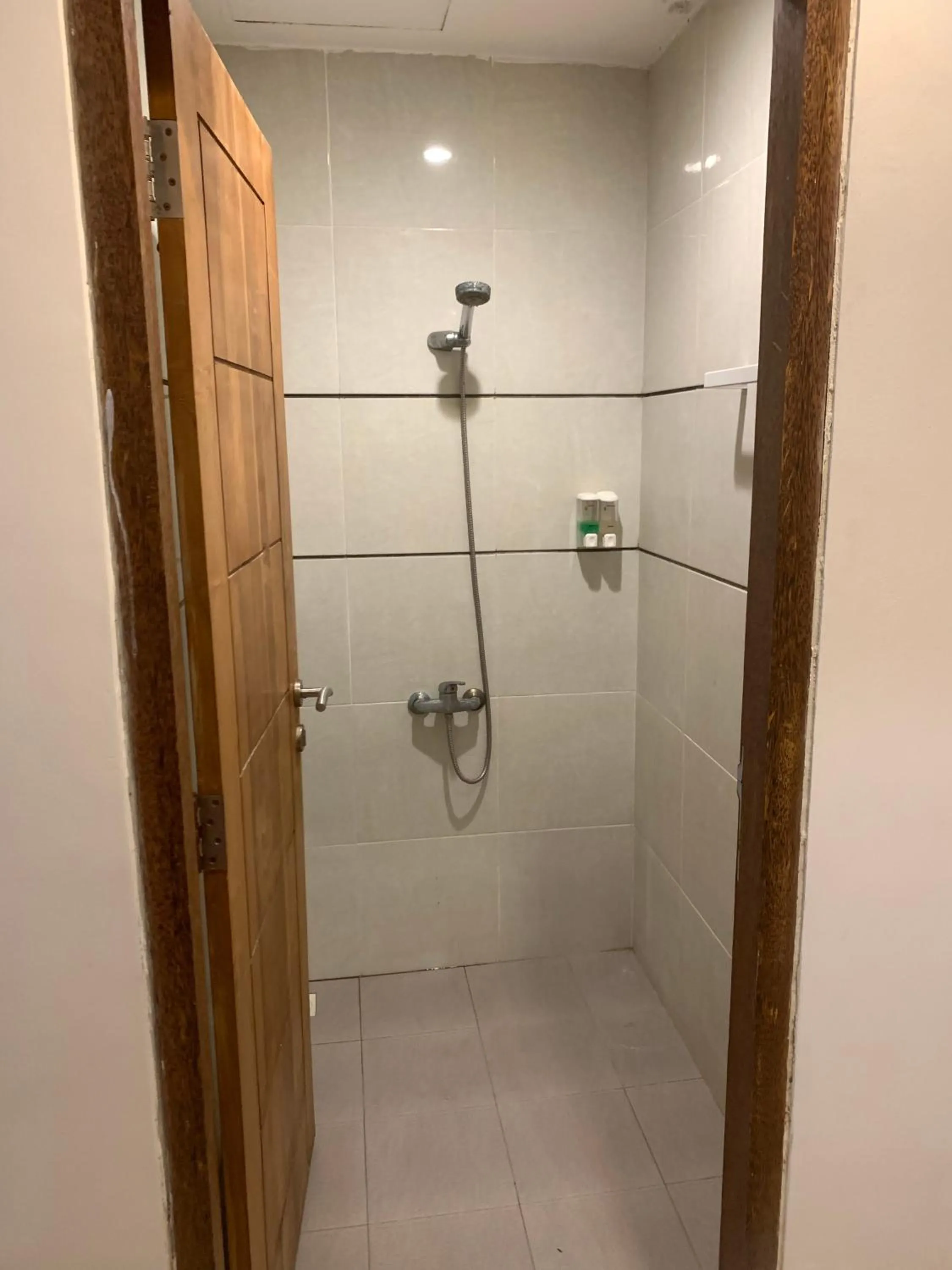 Shower in Kuta Suci Guesthouse