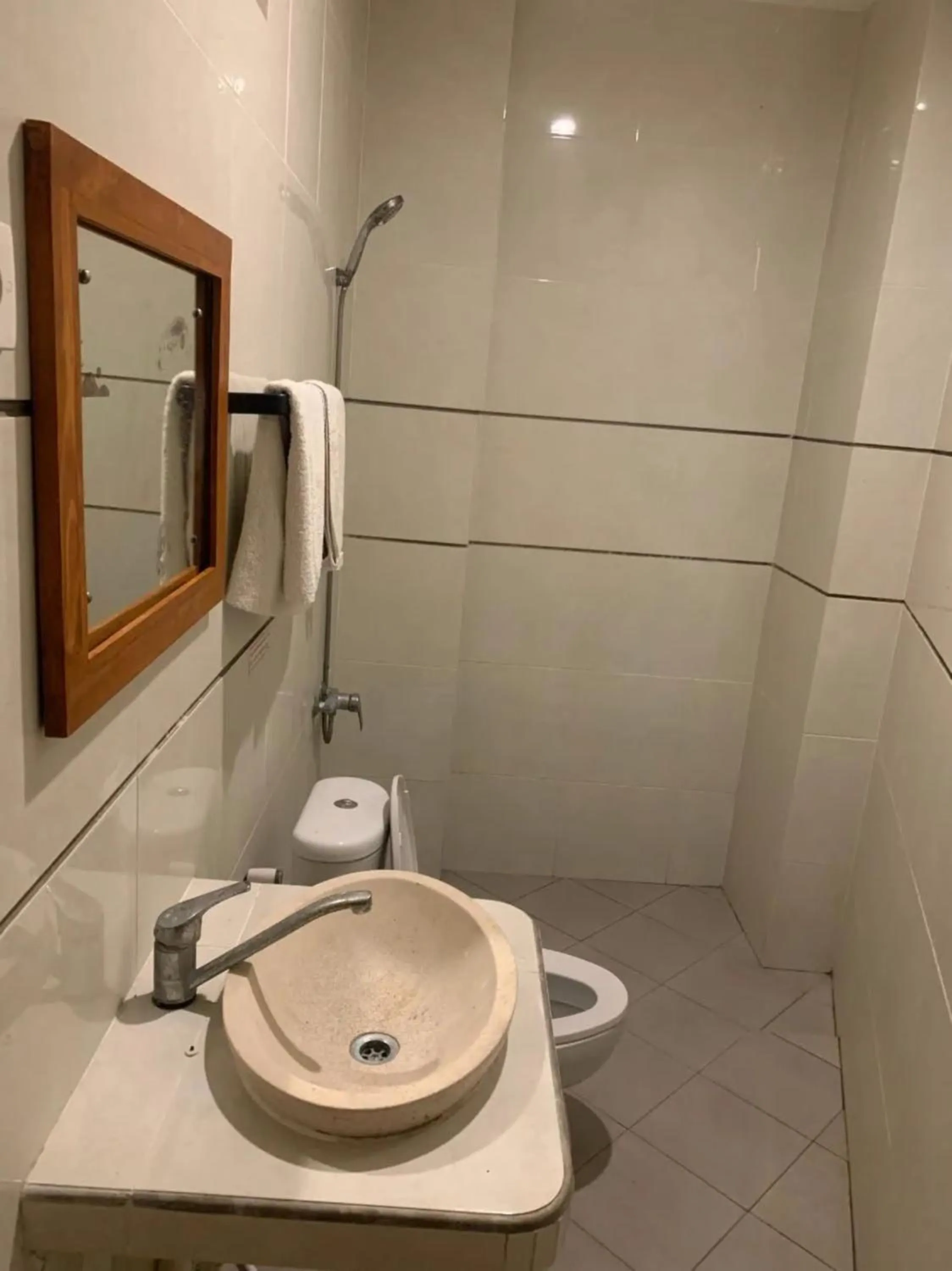 Bathroom in Kuta Suci Guesthouse