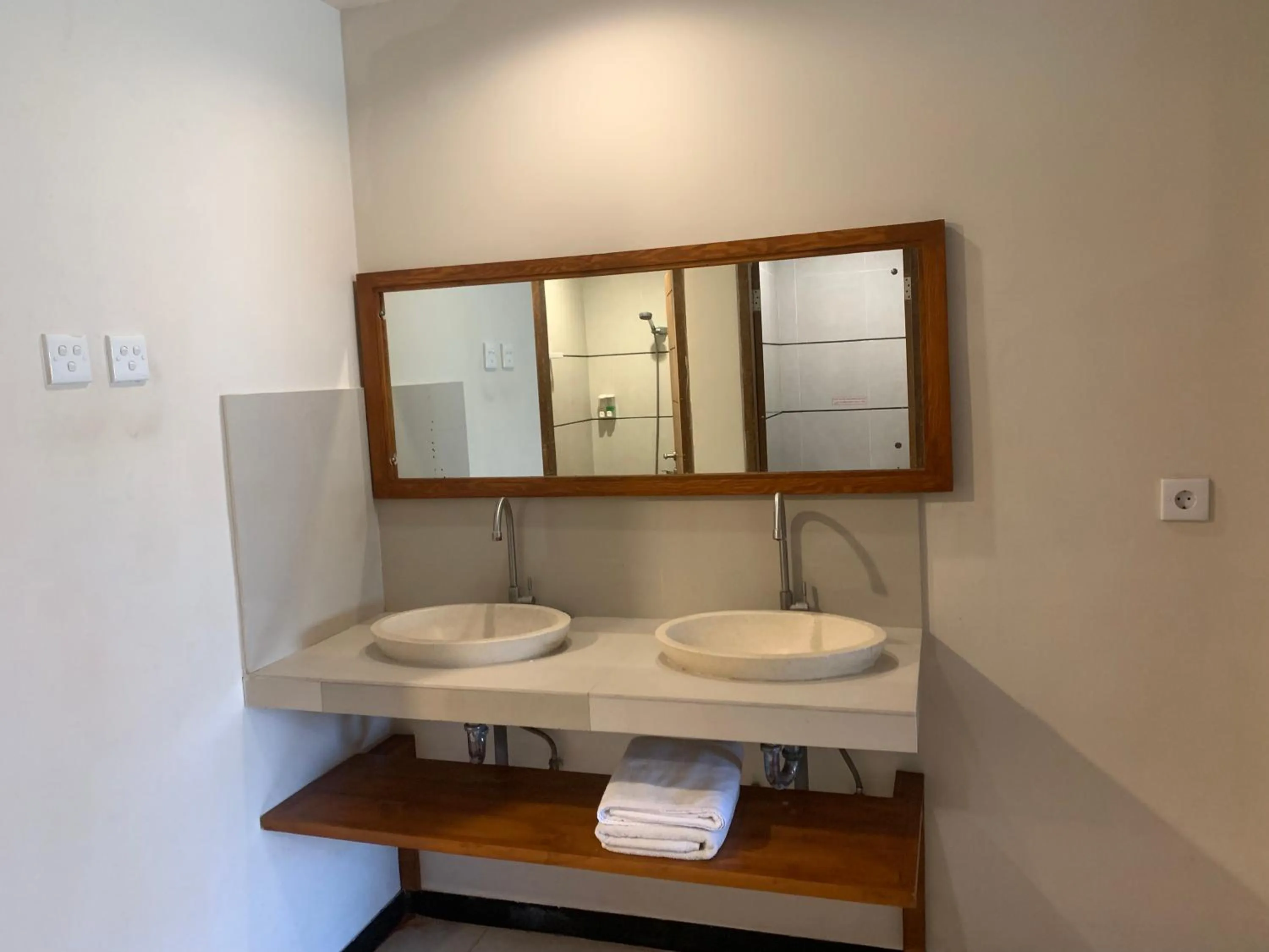 Toilet in Kuta Suci Guesthouse