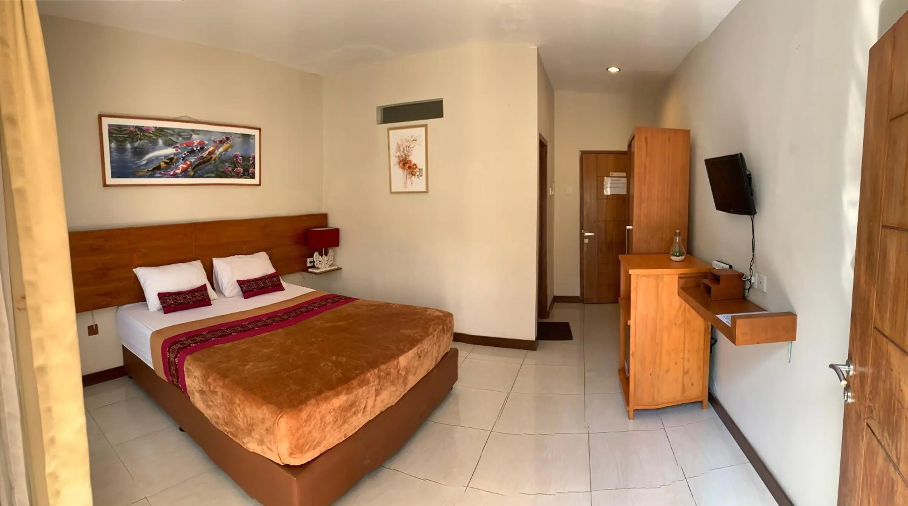 Bed in Kuta Suci Guesthouse