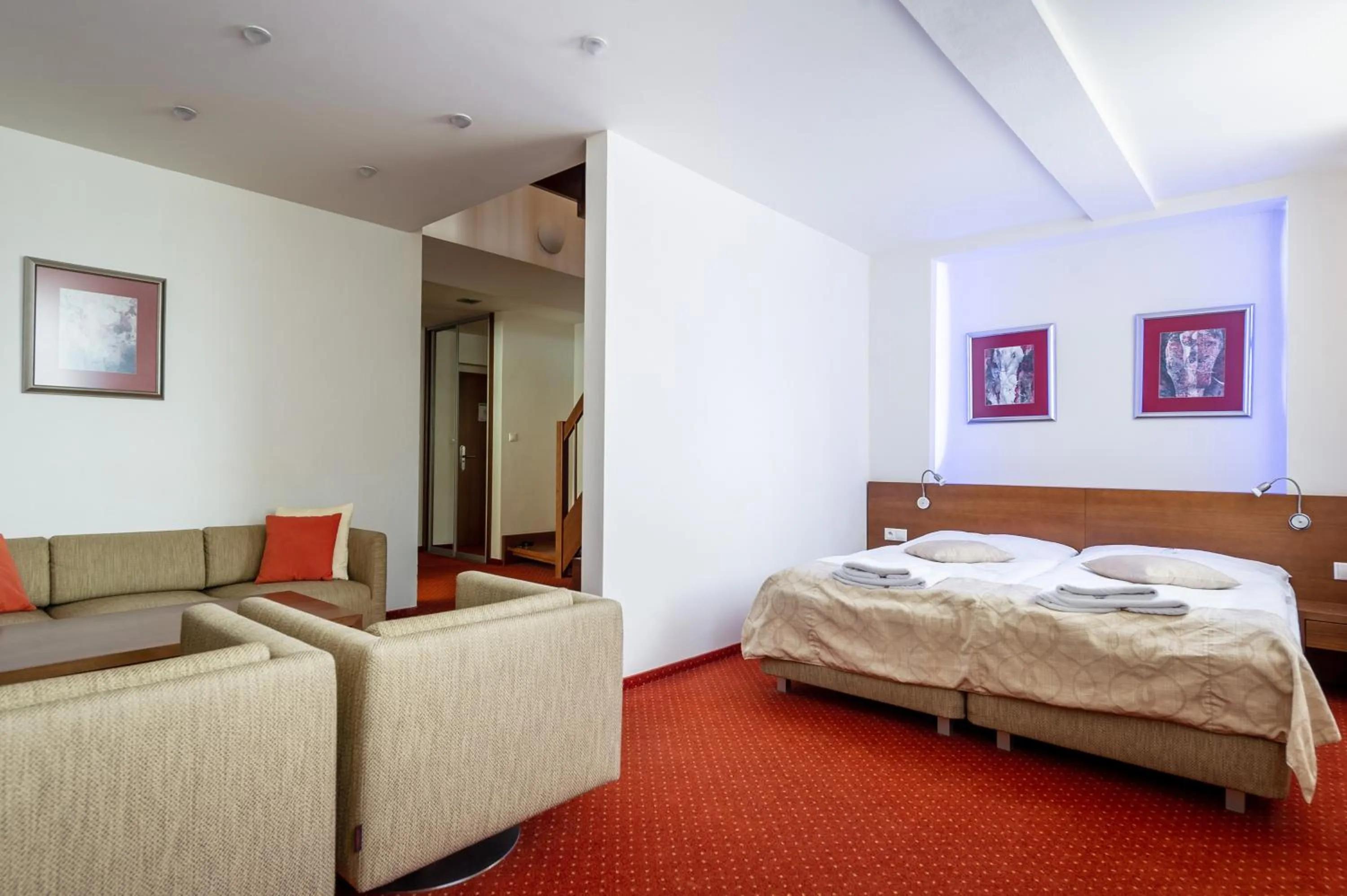 Living room, Bed in Hotel Stupka