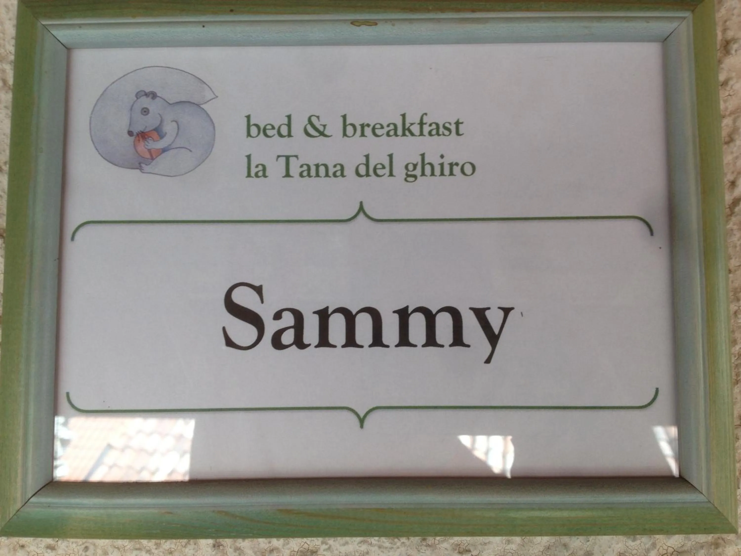 Text overlay in La Tana del Ghiro