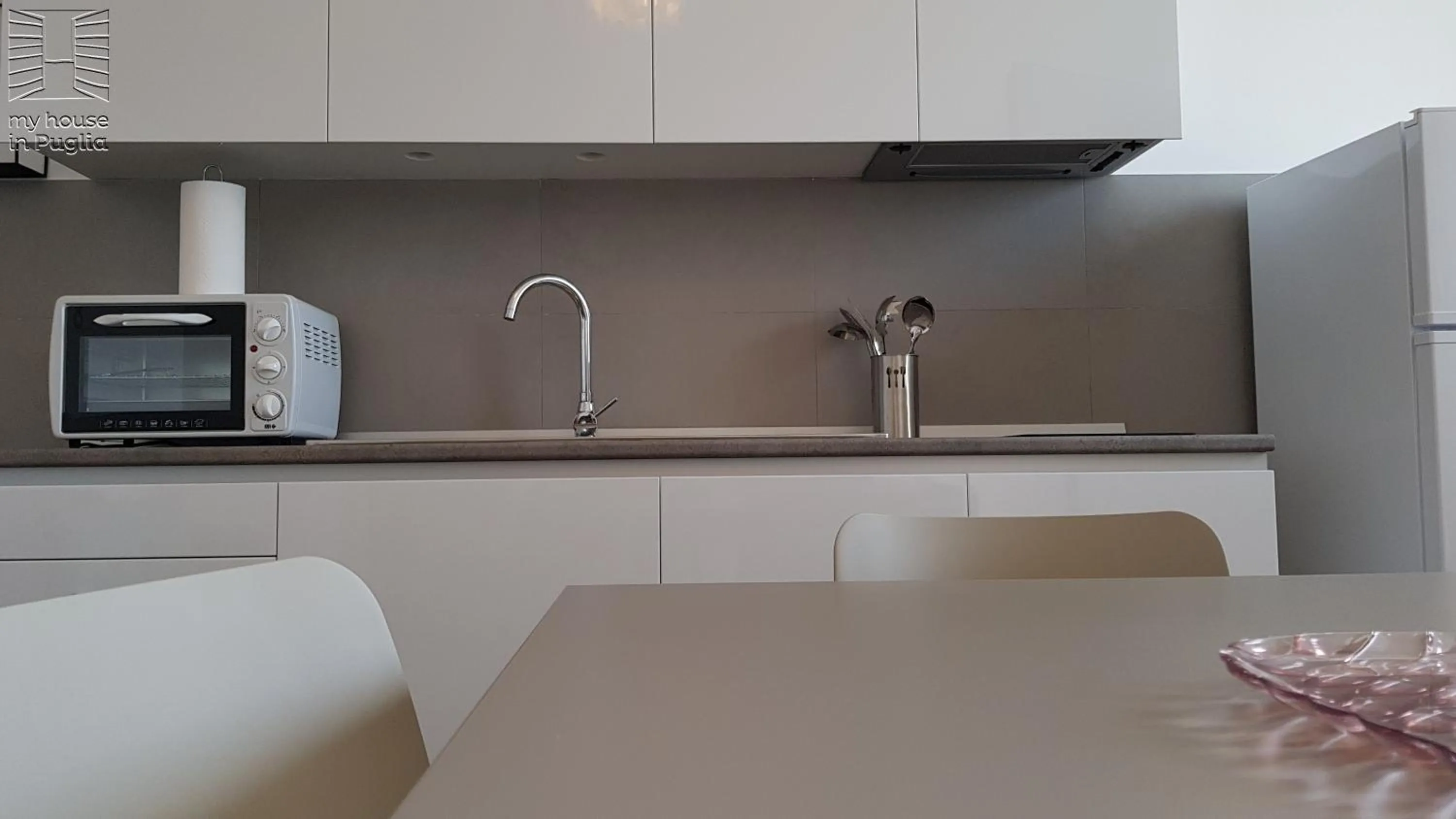 Kitchen or kitchenette in Case Vacanza Marzano