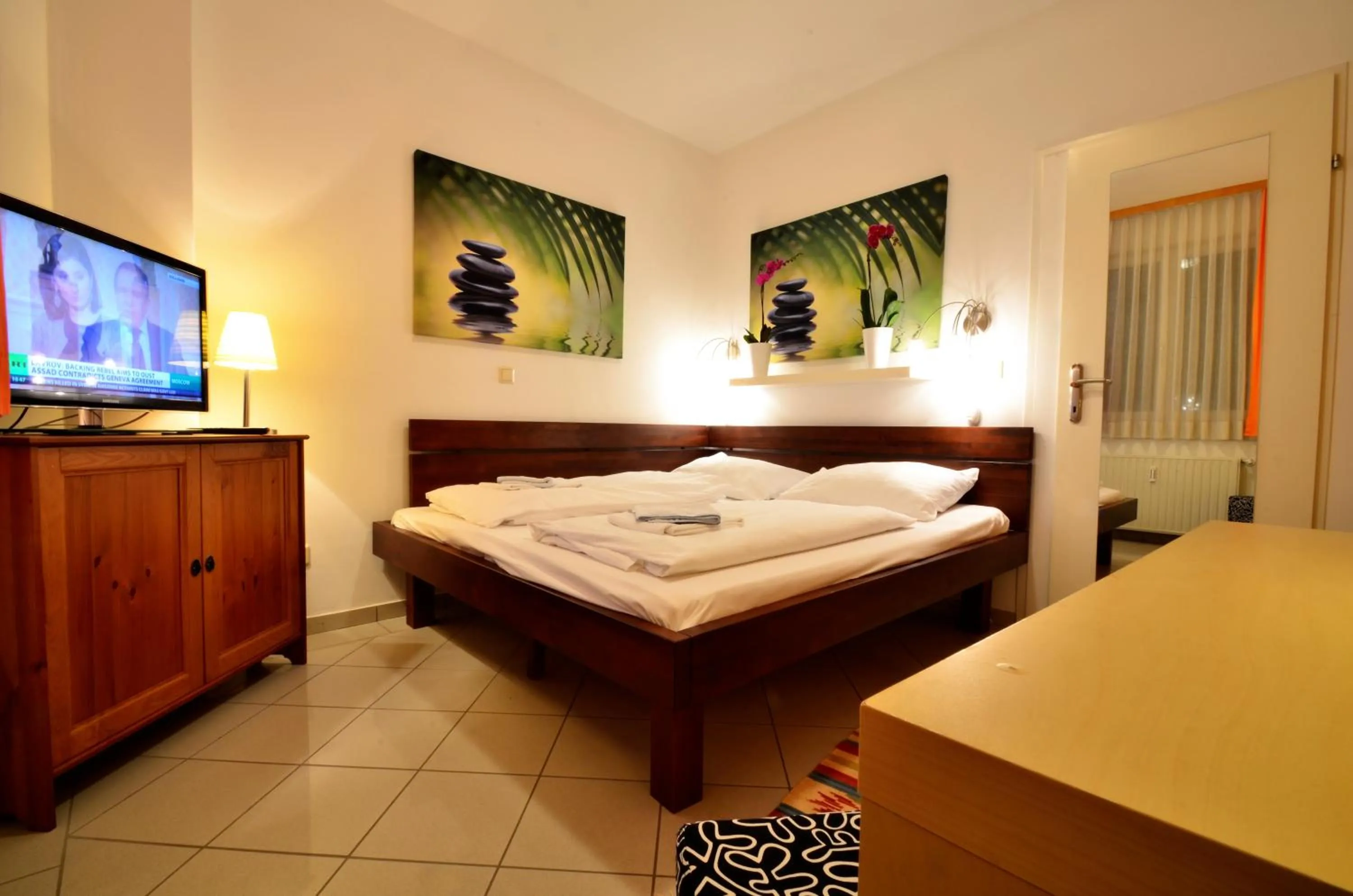 Bedroom, Bed in AJO Apartments - Alte Donau Garden Flat - Self-Check-in