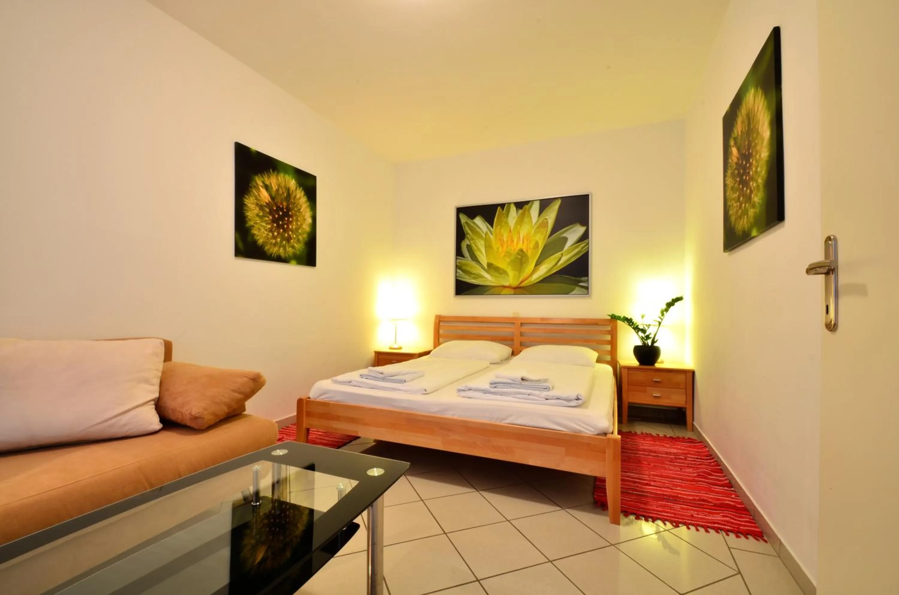 Bedroom, Bed in AJO Apartments - Alte Donau Garden Flat - Self-Check-in