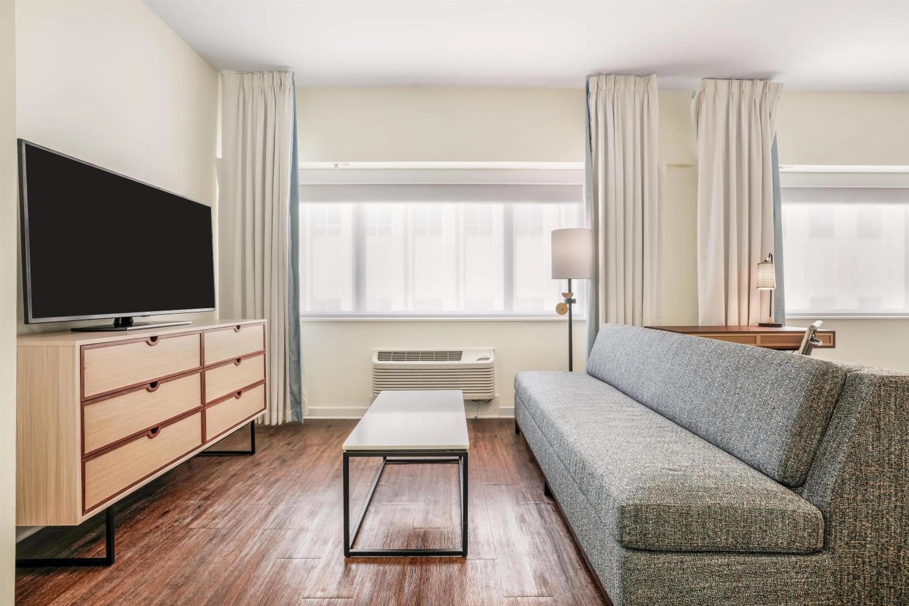 Living room in The Banyan Hotel Fort Myers, Tapestry Collection by Hilton