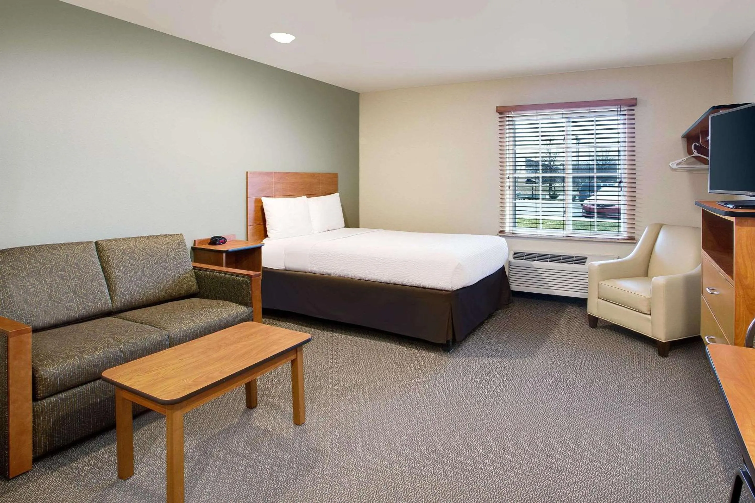 Photo of the whole room, Bed in WoodSpring Suites Fredericksburg