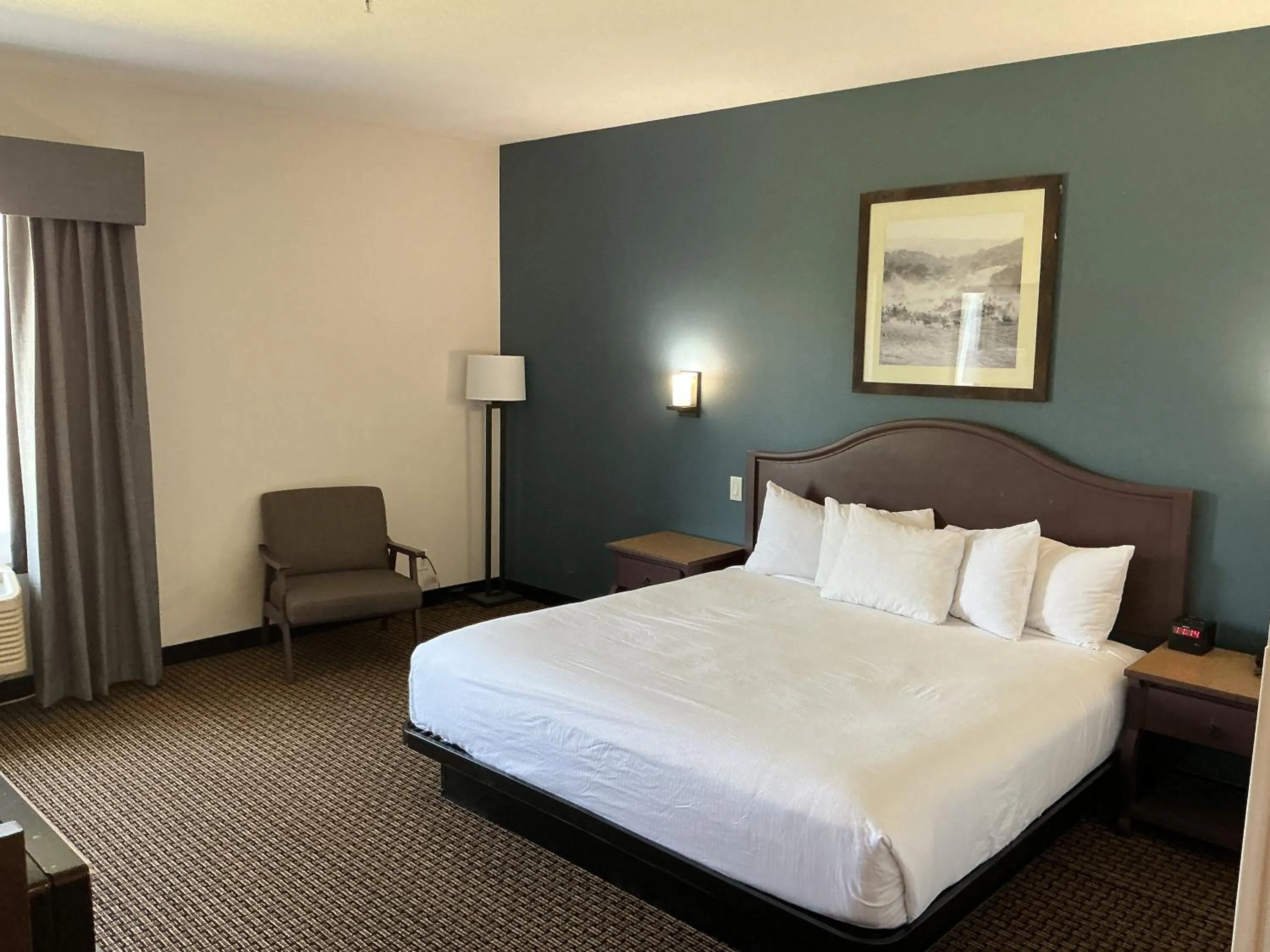 Bed in Tombstone Grand Hotel, a Baymont by Wyndham