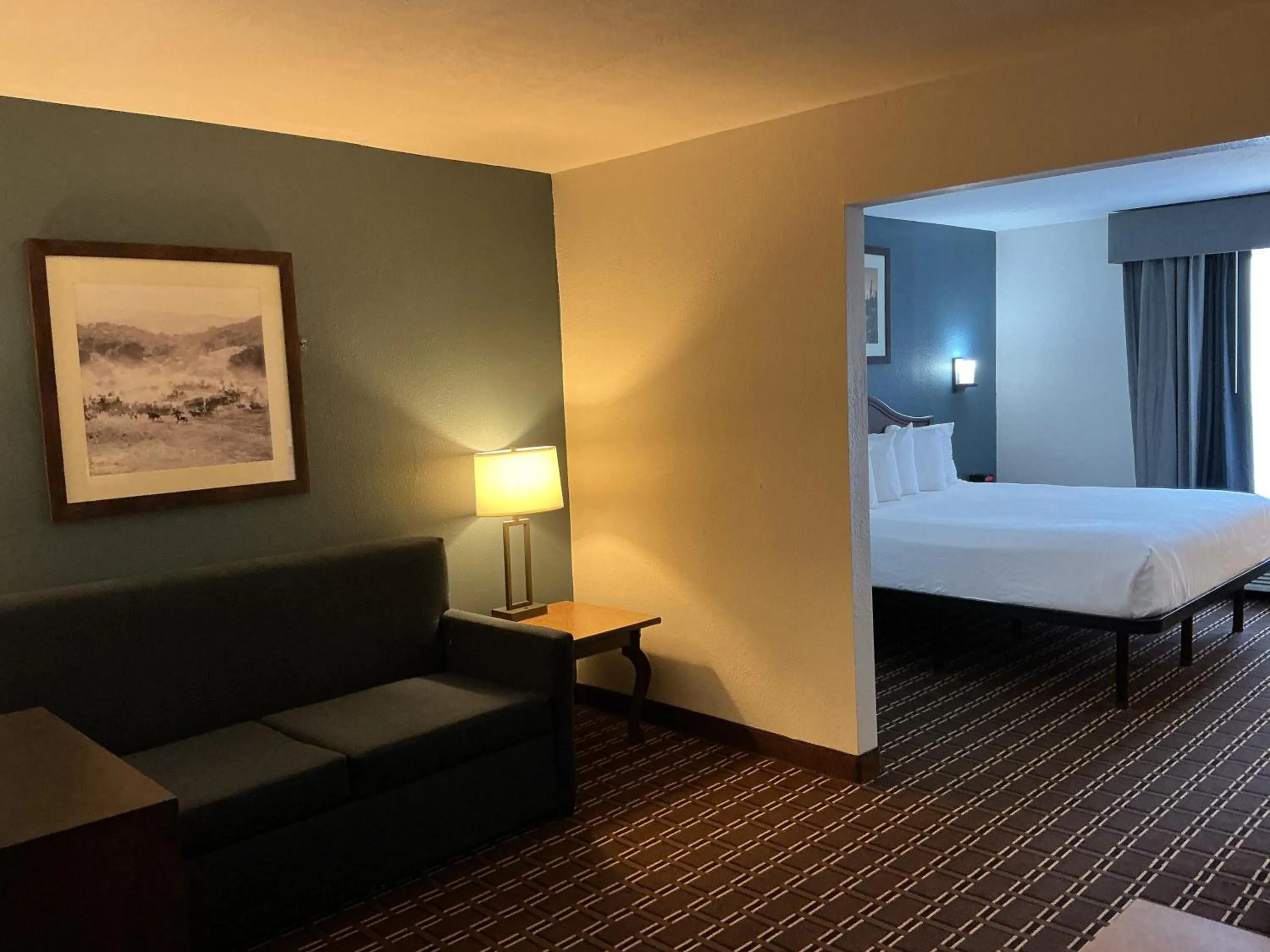 Bed in Tombstone Grand Hotel, a Baymont by Wyndham