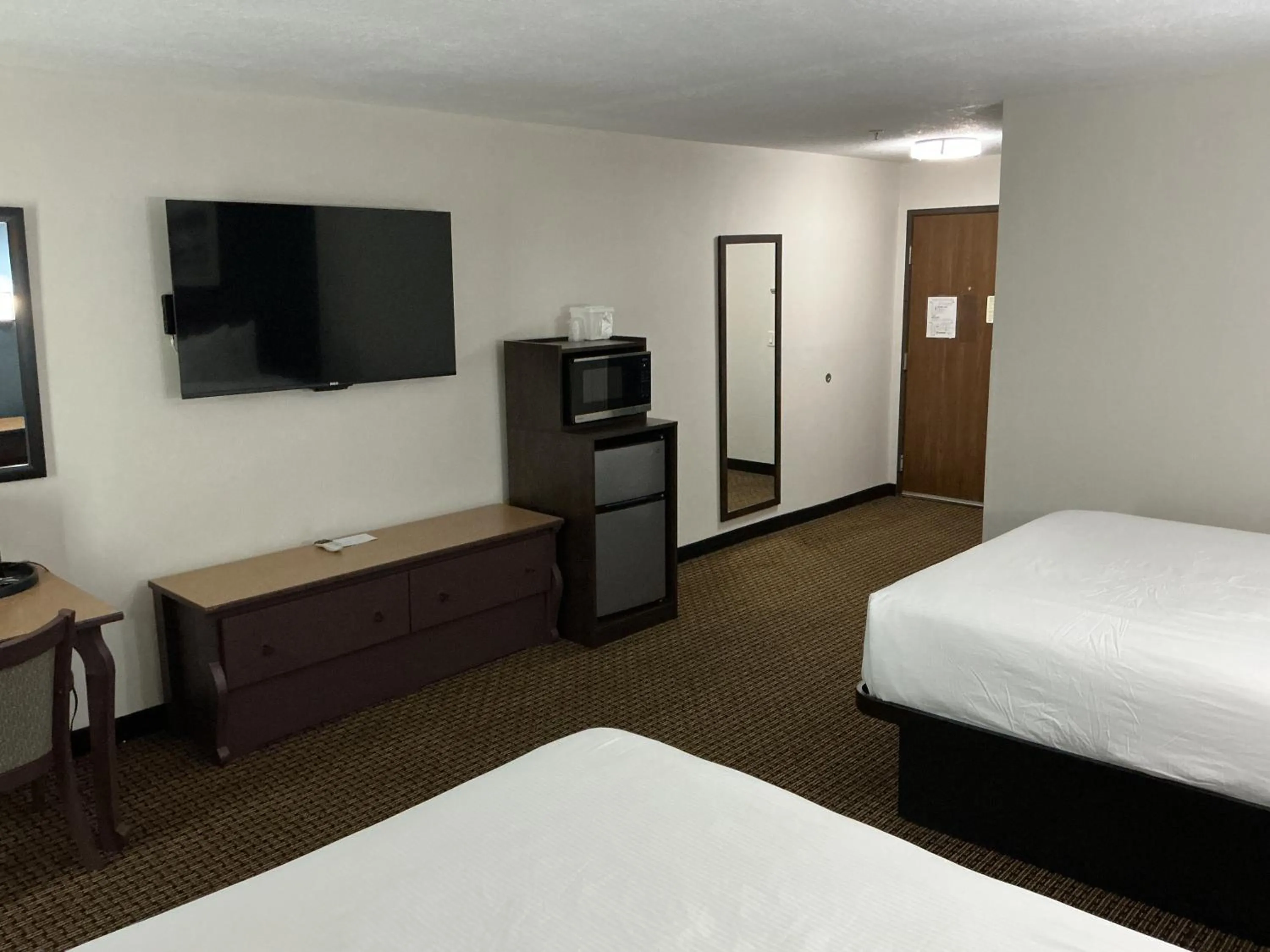 Bed in Tombstone Grand Hotel, a Baymont by Wyndham