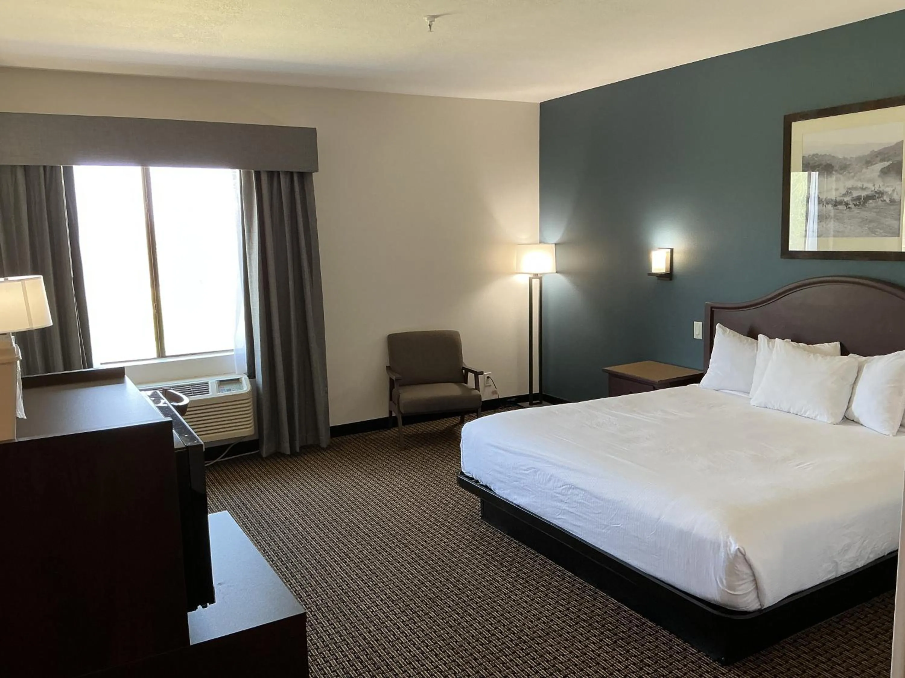 Bed in Tombstone Grand Hotel, a Baymont by Wyndham