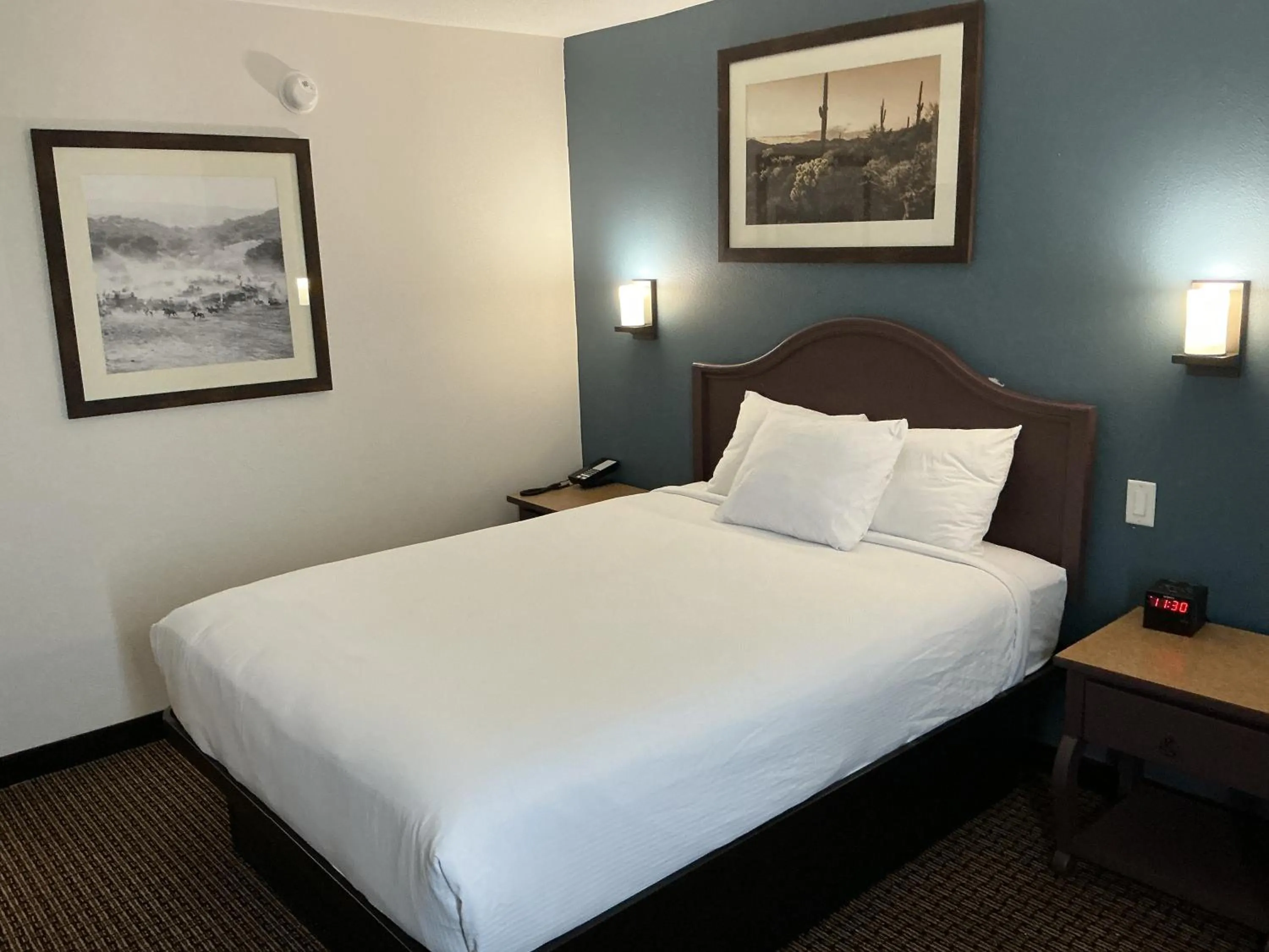 Bed in Tombstone Grand Hotel, a Baymont by Wyndham