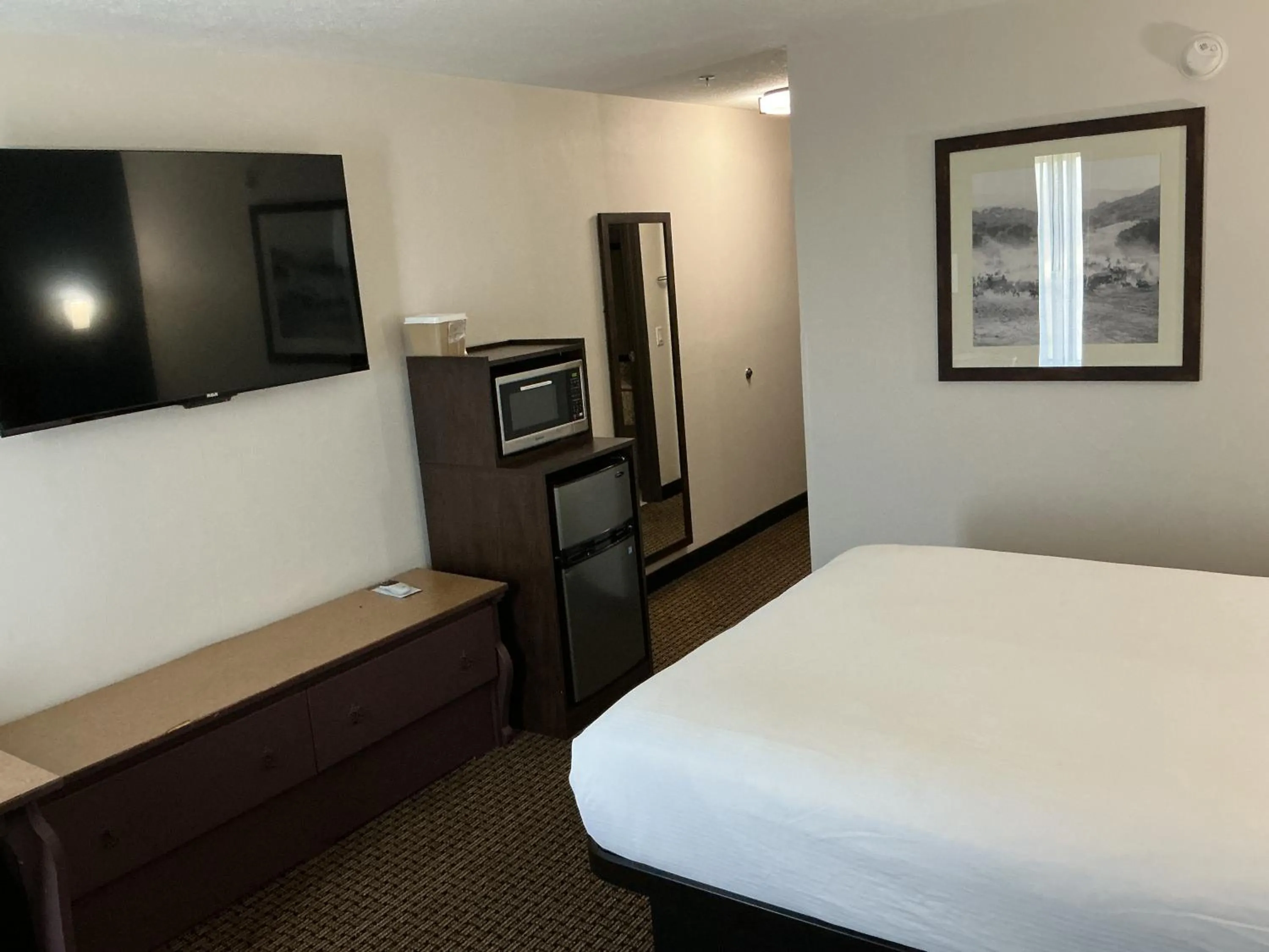 Bed in Tombstone Grand Hotel, a Baymont by Wyndham