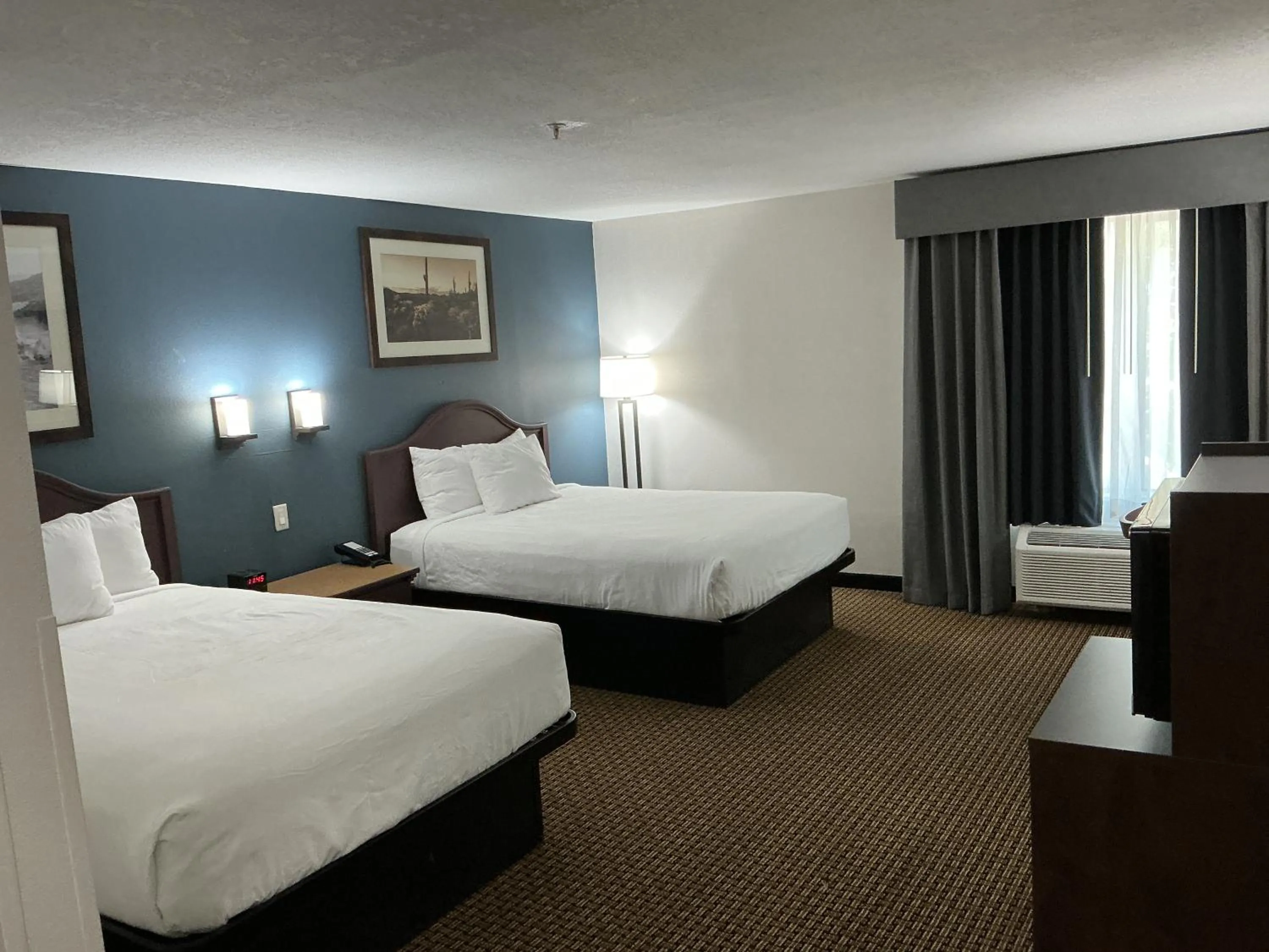 Bed in Tombstone Grand Hotel, a Baymont by Wyndham