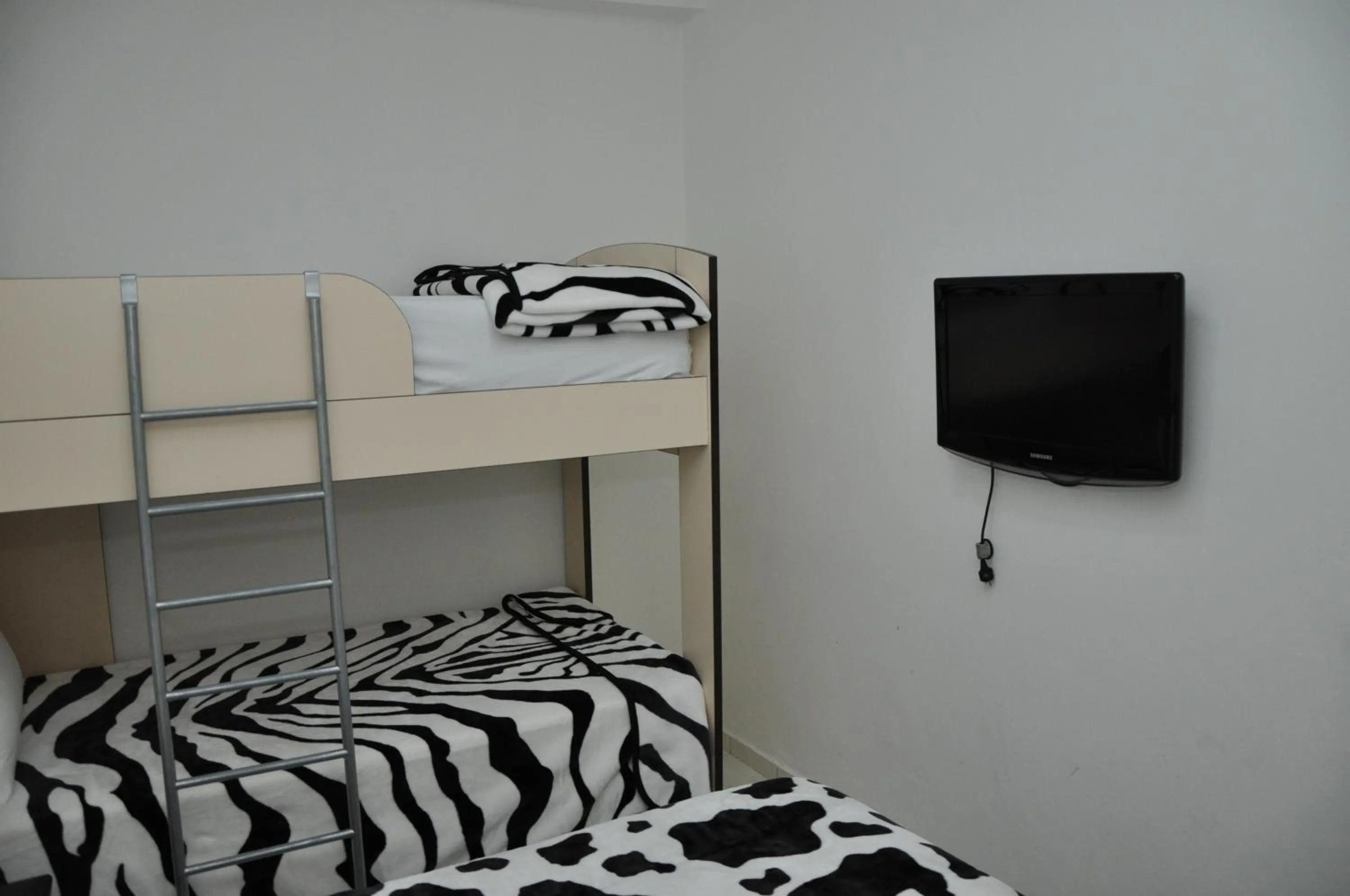 bunk bed, Bed in Sunrise Hotel Cameria