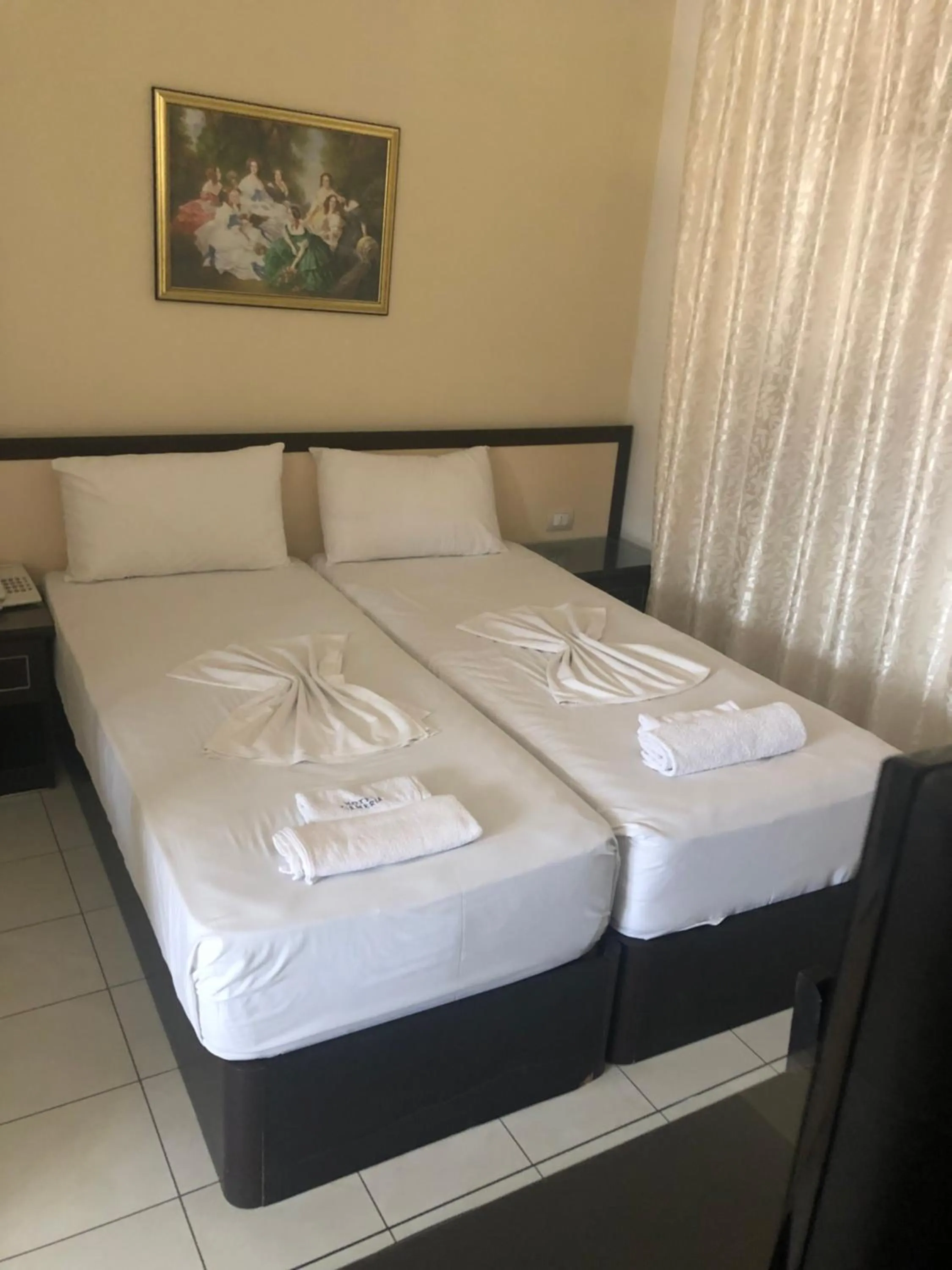 Bed in Sunrise Hotel Cameria